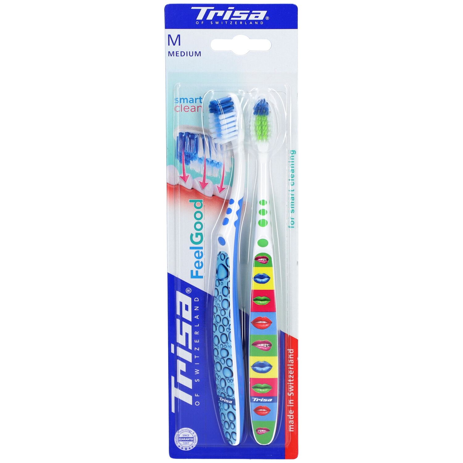 Deux brosses à dents dans un emballage blister. Têtes de brosse bleues et blanches. Inscription "FeelGood" et "smart clean".