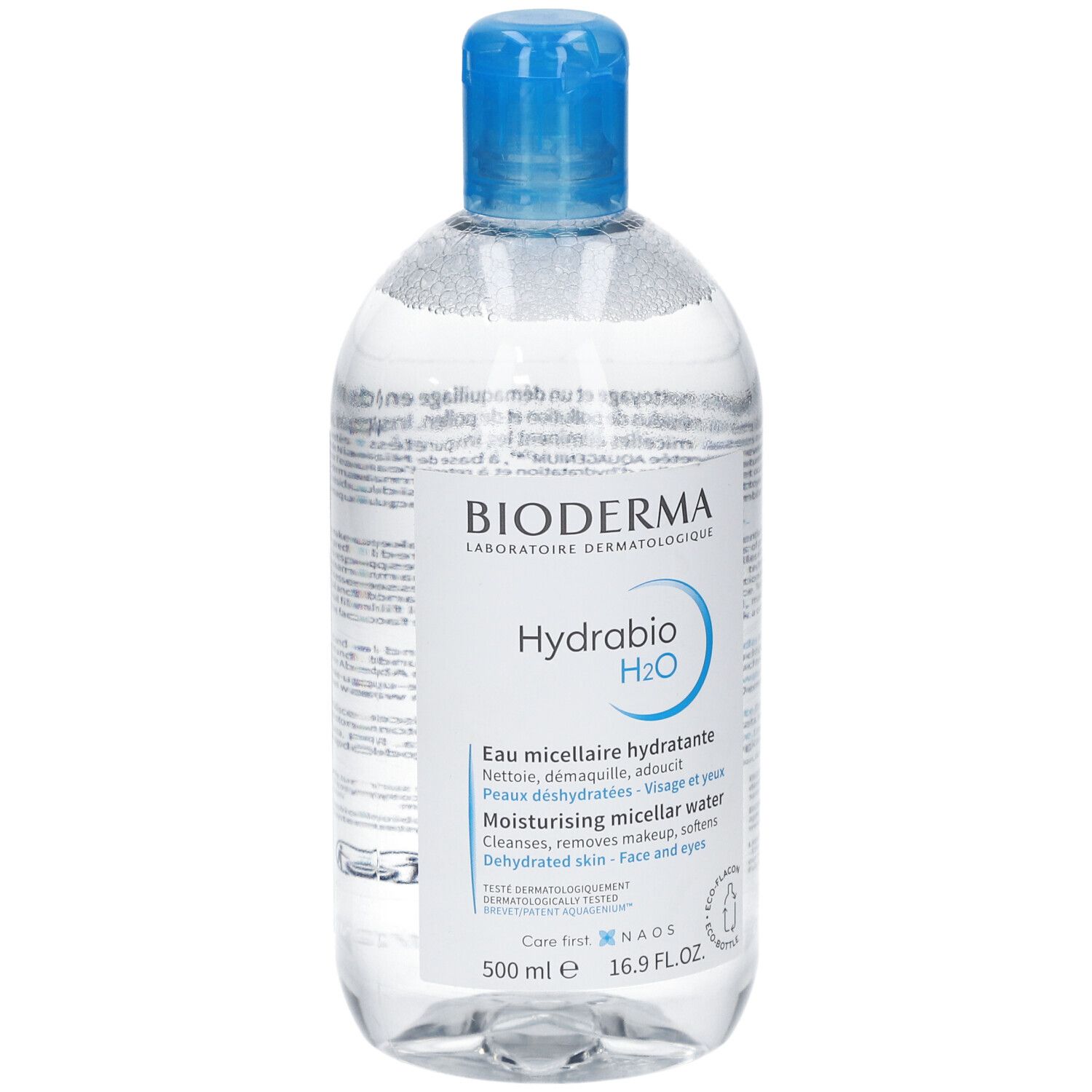 Flacon transparent avec bouchon bleu. Inscription: Bioderma, Hydrabio H2O. Eau micellaire pour visage et yeux.