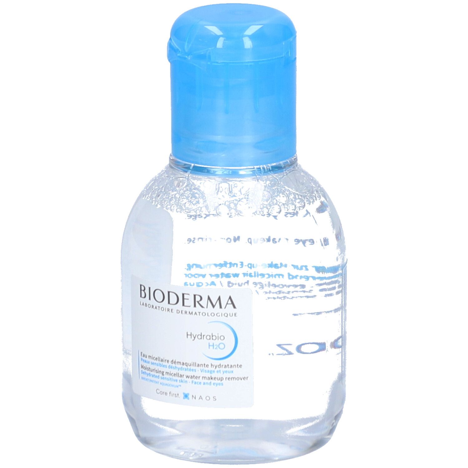 Klare Flasche mit blauem Deckel. Aufschrift: BIODERMA, Hydrabio H2O. Micellaire Reinigungswasser.