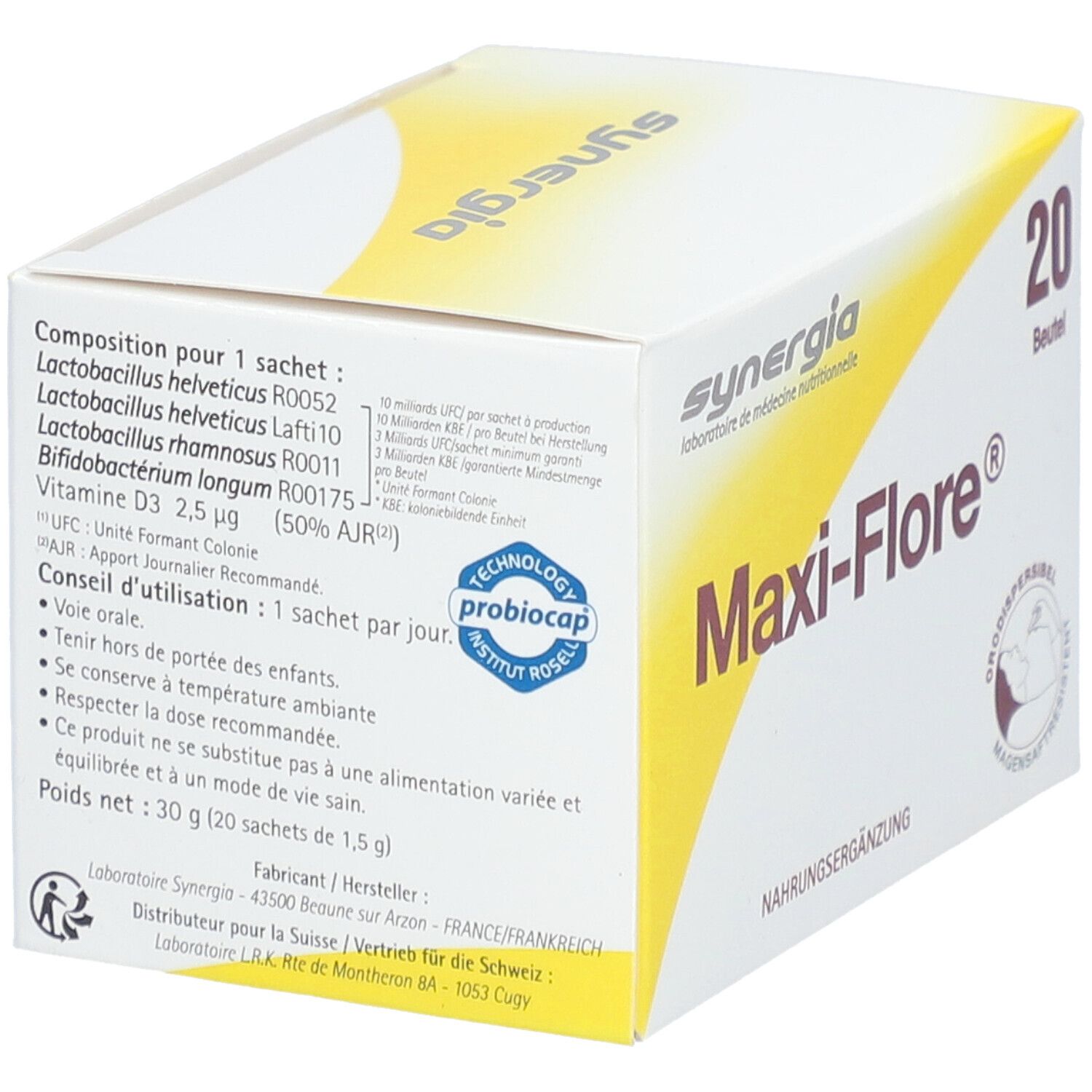 Weißer Karton mit gelbem Akzent. Aufschrift 'Maxi-Flore®' und '20 Beutel'. Marke: Synergia. Probiocap-Logo.