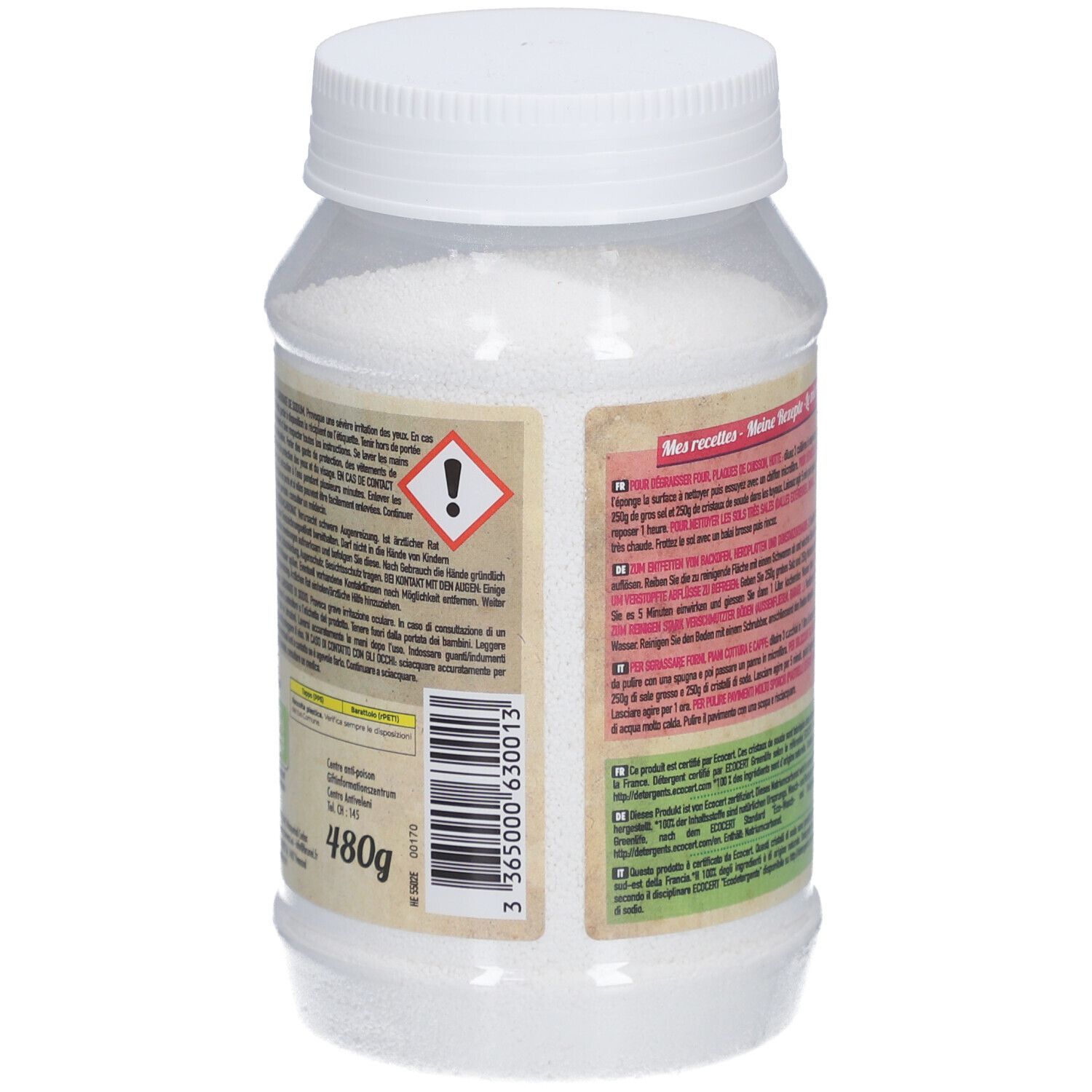 Récipient transparent avec poudre blanche. Dos avec texte, symbole d'avertissement et code-barres. Couvercle blanc.