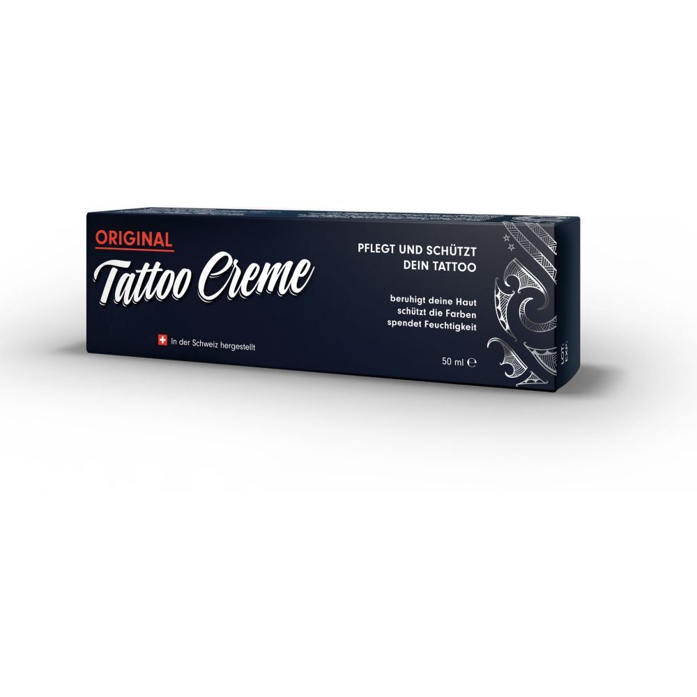 Dunkelblaue Schachtel mit "ORIGINAL Tattoo Creme"-Logo. Text: "Pflegt und schützt dein Tattoo". Hergestellt in der Schweiz.