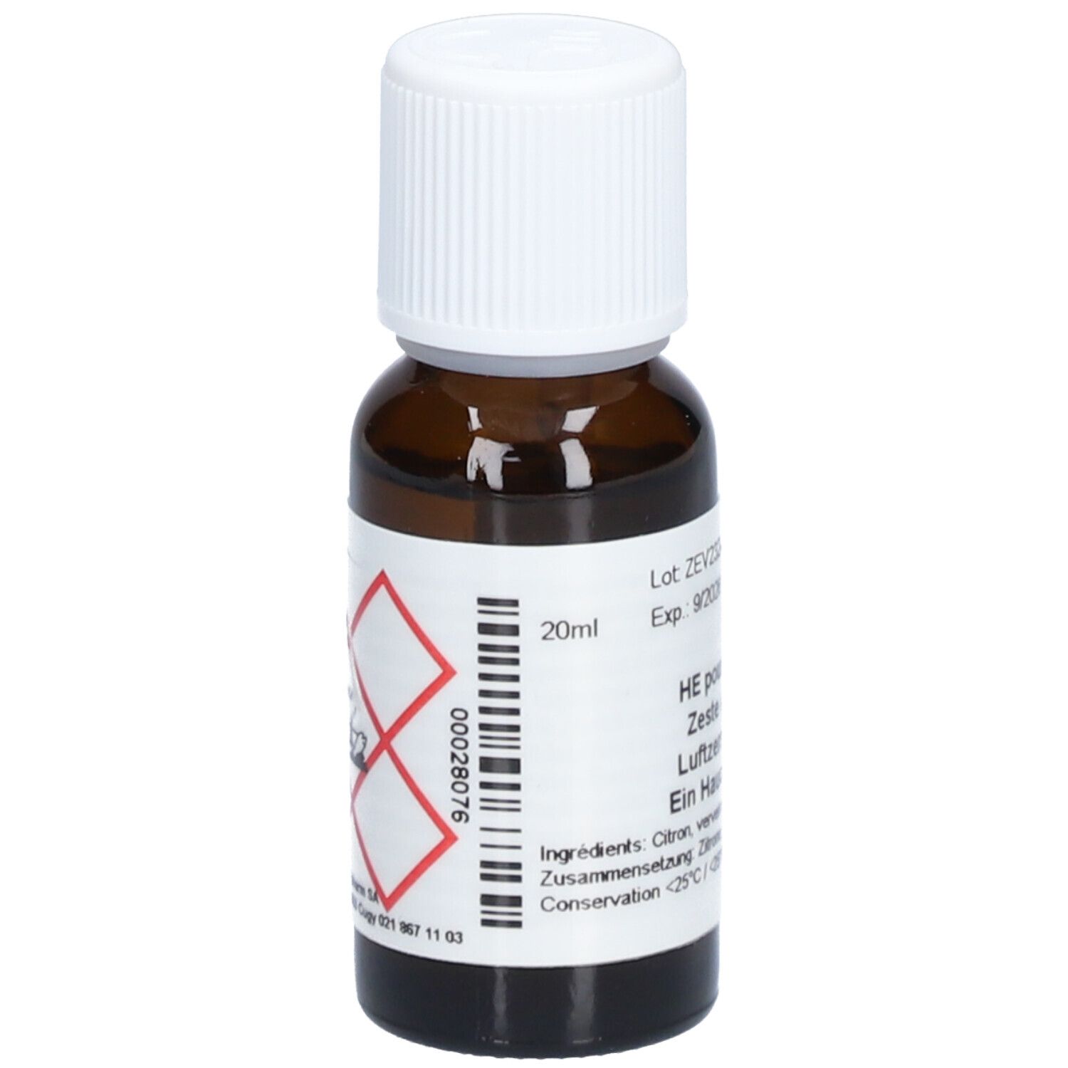Flacon en verre brun avec bouchon blanc. Étiquette avec texte, symboles de danger et logo. Inscription: 20ml, HE pour diffuseur.