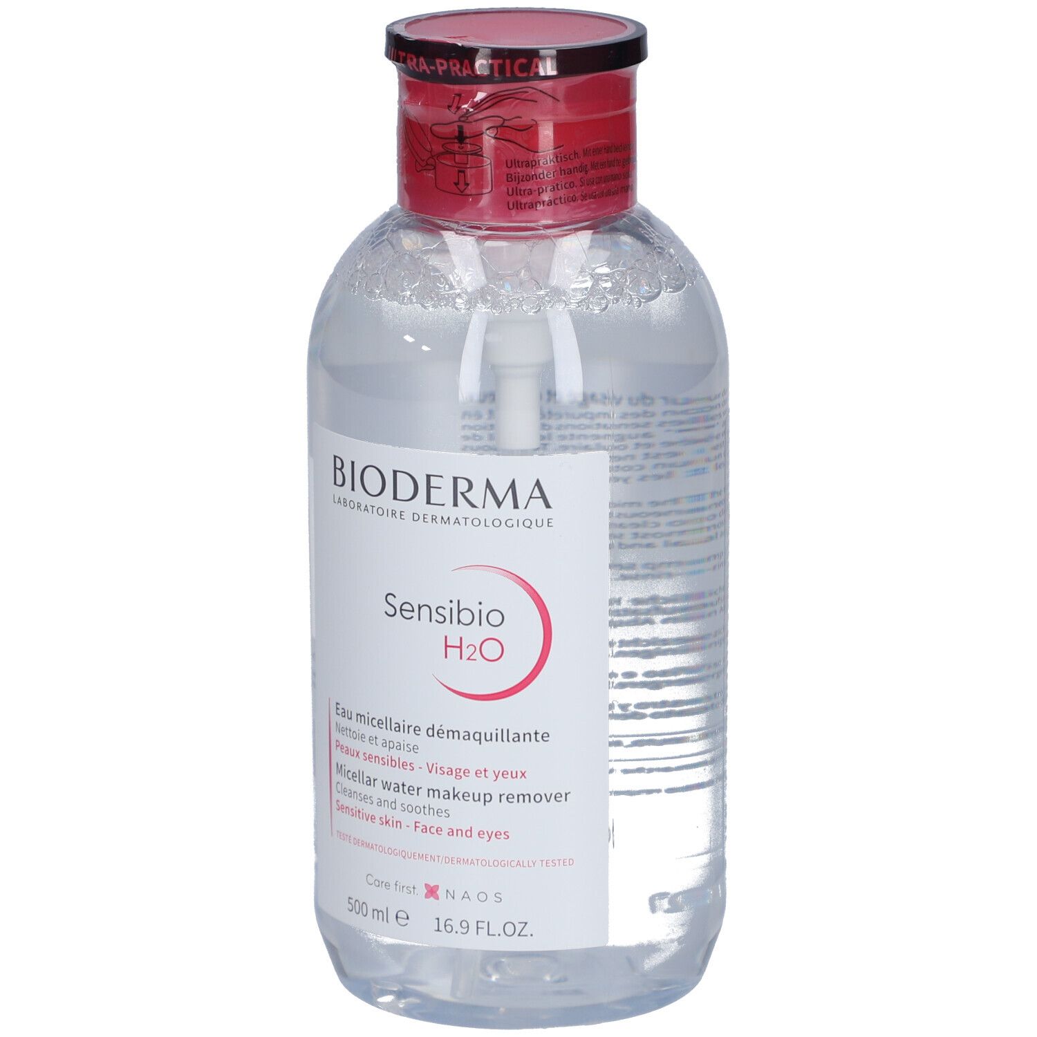 Klare Flasche mit rotem Deckel und Pumpe. Aufschrift: BIODERMA Sensibio H2O. Mizellares Reinigungswasser für empfindliche Haut.