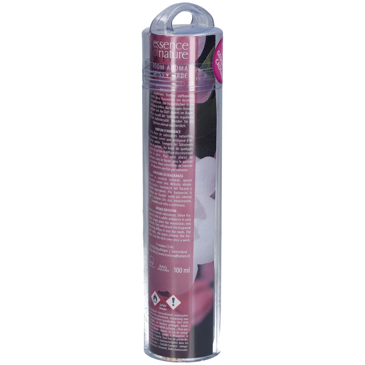 Transparente Verpackung mit Raumduft-Sticks. Rückseite mit Produktinformationen und floralem Design. Enthält eine 100 ml Angabe.