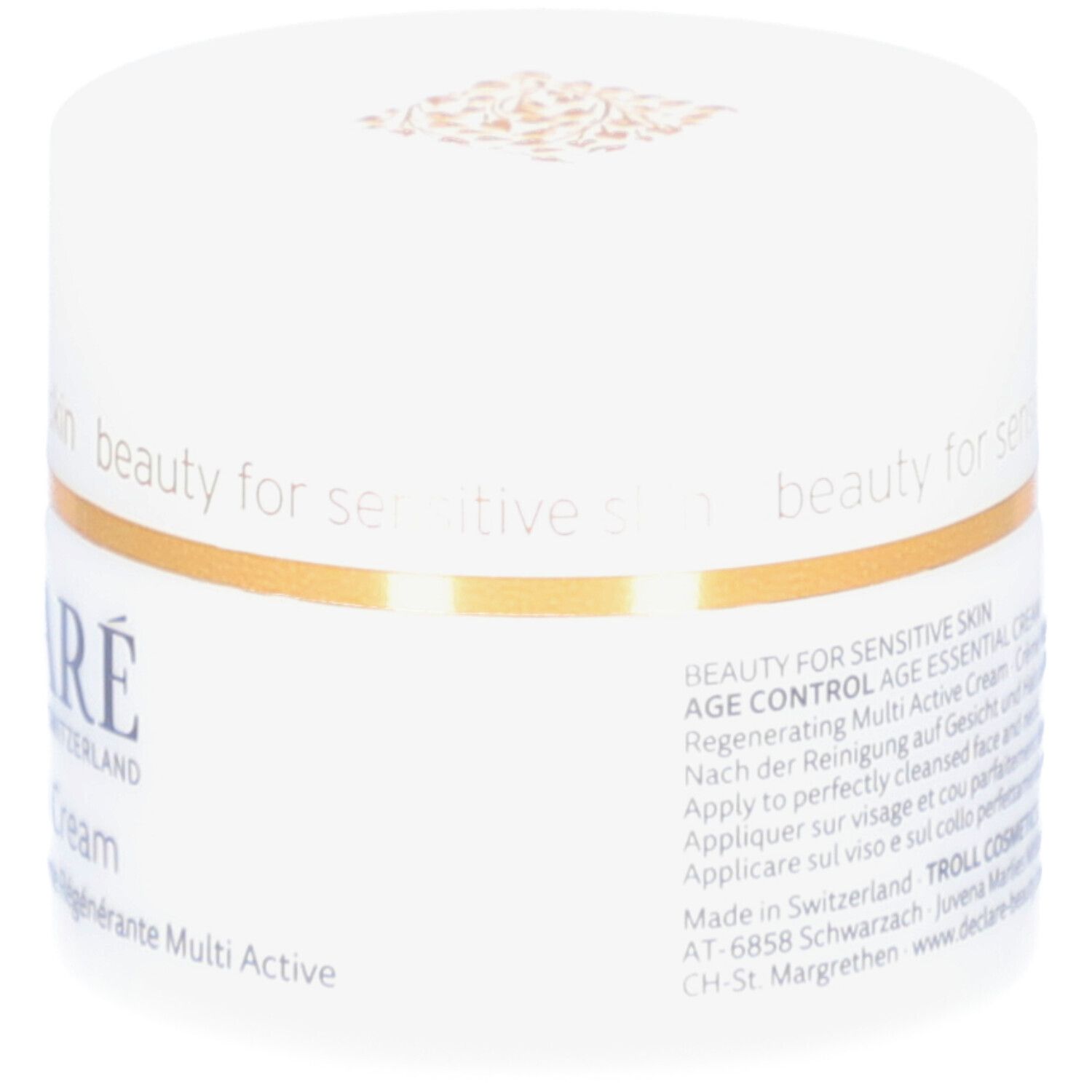 Weißer Tiegel mit goldfarbenem Ring. Aufschrift: DECLARÉ, Age Essential Cream. Text auf dem Tiegel.