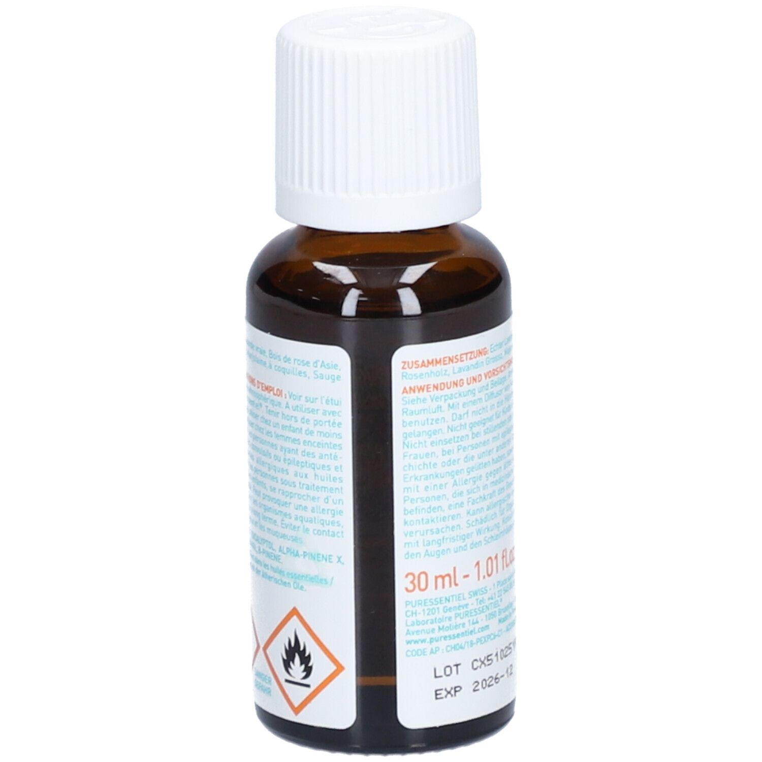Flacon en verre brun avec bouchon blanc. Étiquette avec informations produit et avertissements. Texte: Huiles essentielles pour diffusion Provence.