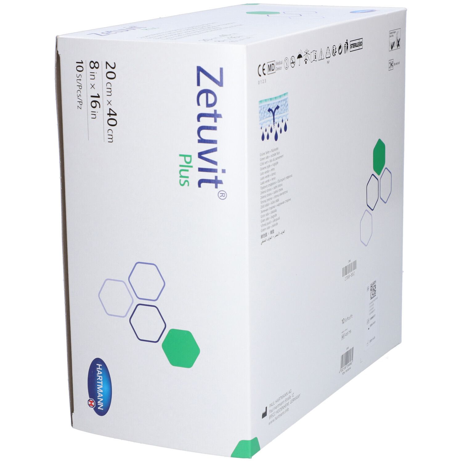 Verpackung von Zetuvit® Plus. Zeigt Produktnamen, Größenangabe 20 x 40 cm und Logo. Eckdetail mit grünem Akzent. Mehrsprachige Angaben.