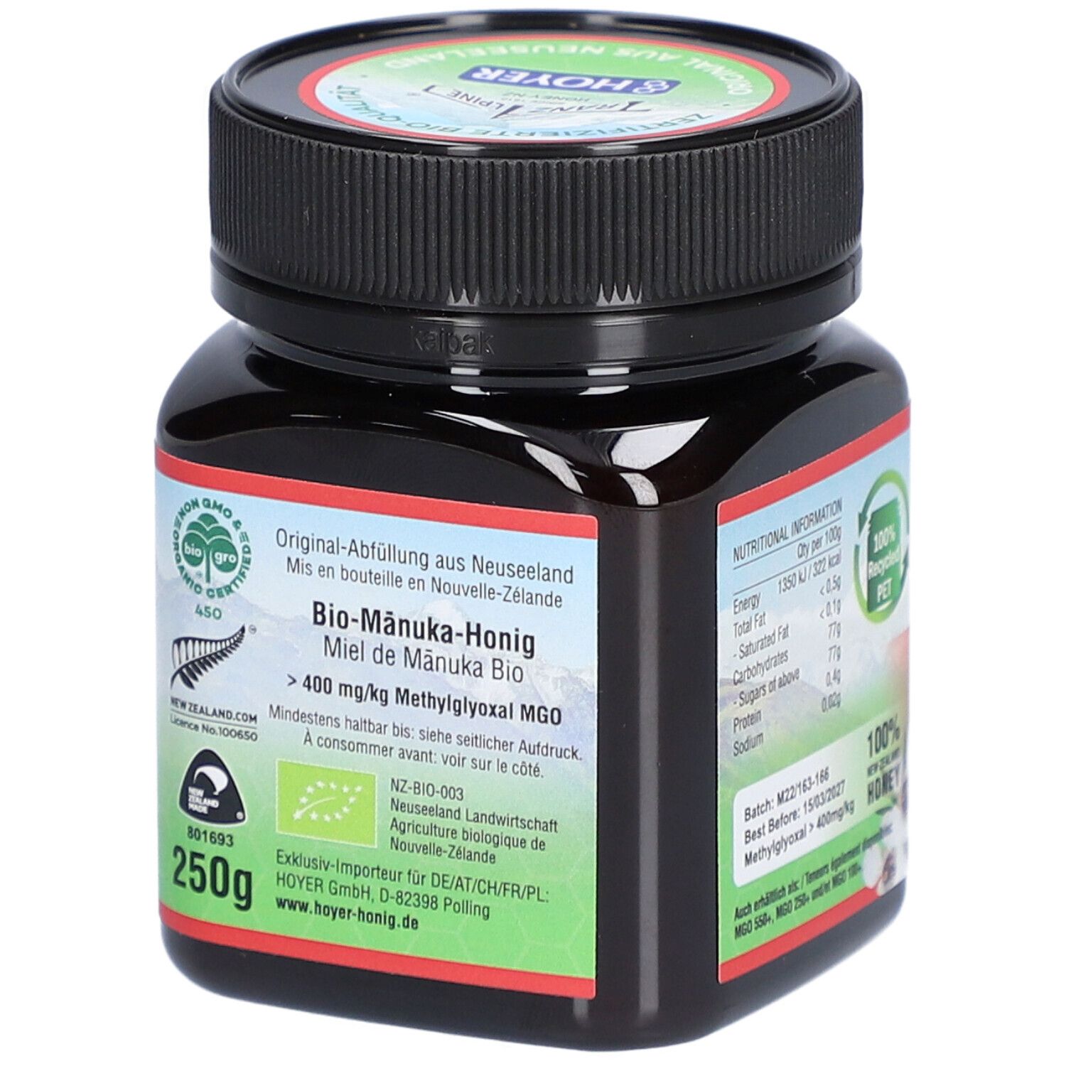 Pot en verre brun avec couvercle noir. Étiquette avec texte : Bio-Manuka-Honig, MGO > 400 mg/kg Methylglyoxal.