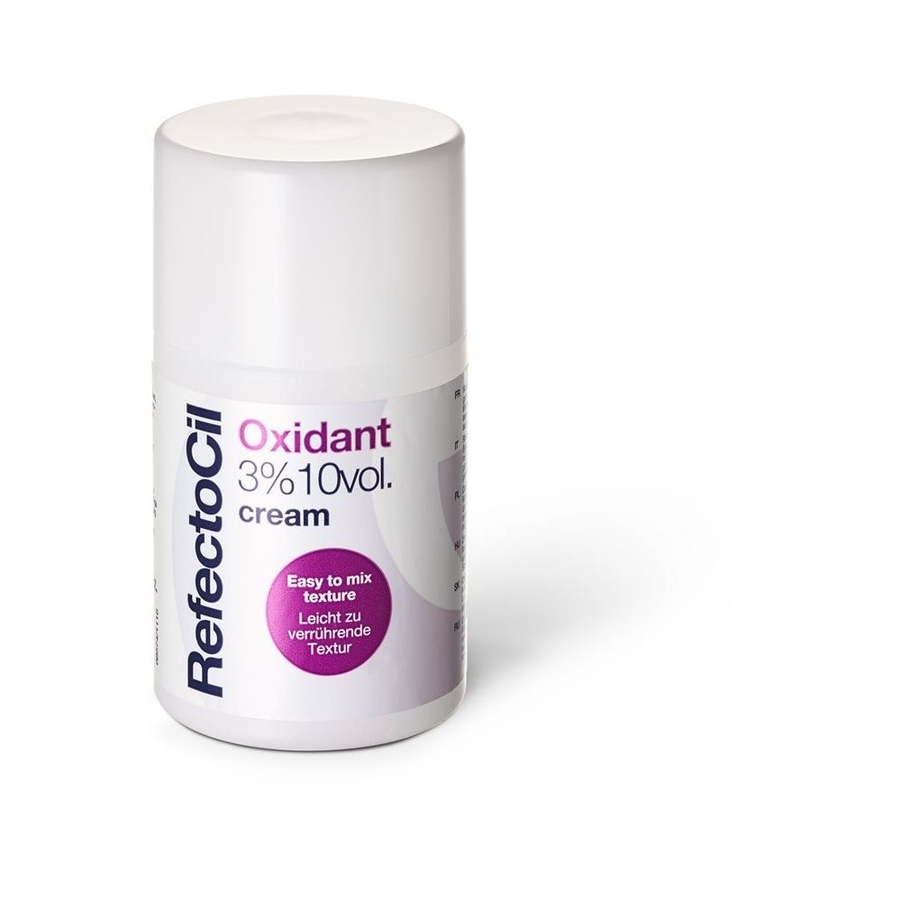 Flacon blanc avec texte "RefectoCil Oxidant 3% 10vol. cream". Étiquette avec texte "Easy to mix texture".