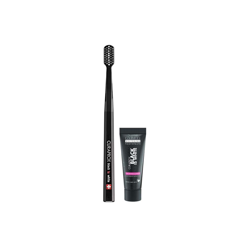 CURAPROX Schwarz ist Weiß Light-Pack. Schwarze Zahnbürste und Zahnpasta. Zahnbürste mit schwarzem Borstenkopf. Marke sichtbar.