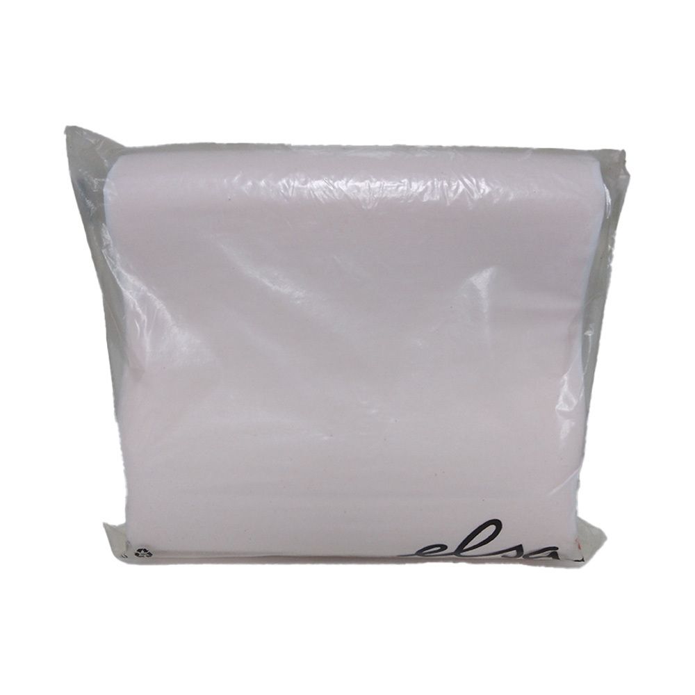 Weißes Kissen in transparenter Plastikverpackung mit schwarzem Schriftzug.