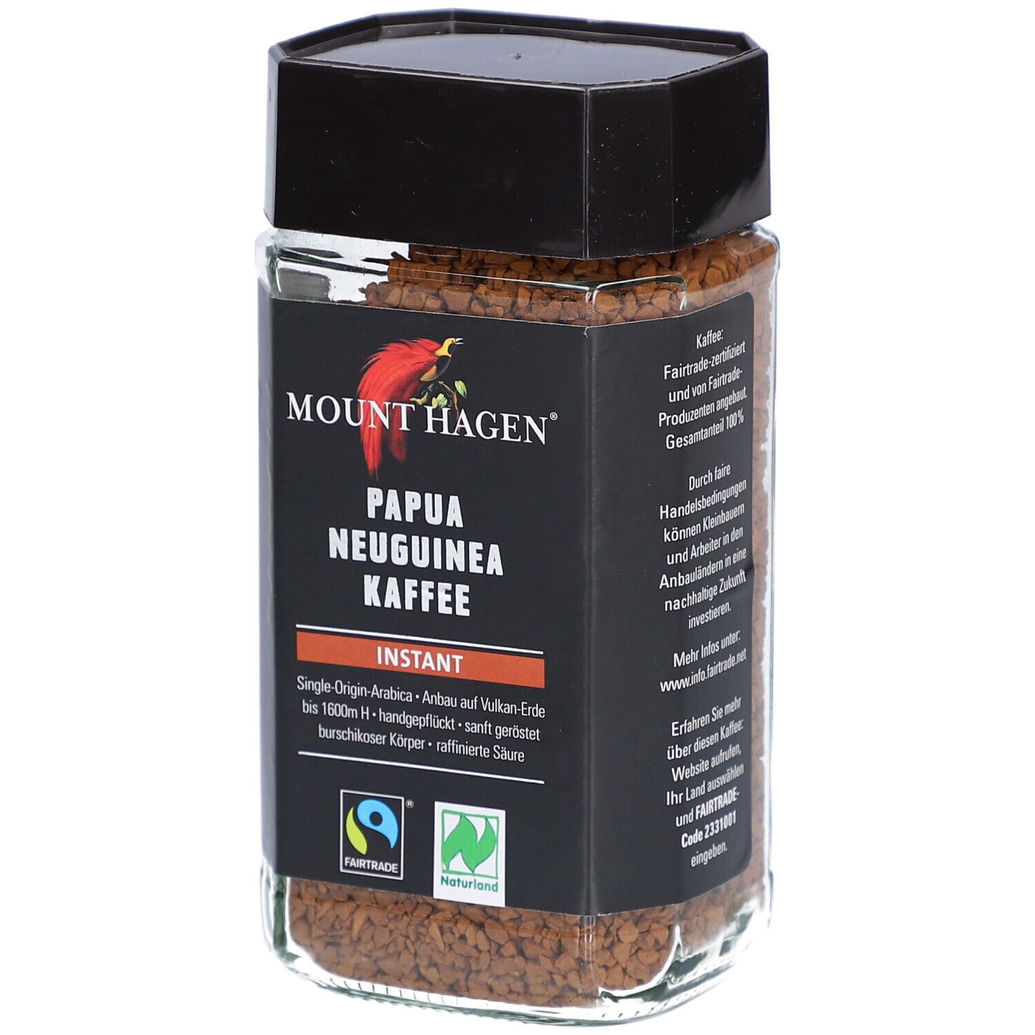 Glas mit Instant Kaffee. Aufschrift: Mount Hagen Papua Neuguinea Kaffee. Fairtrade-Siegel und Naturland-Siegel.