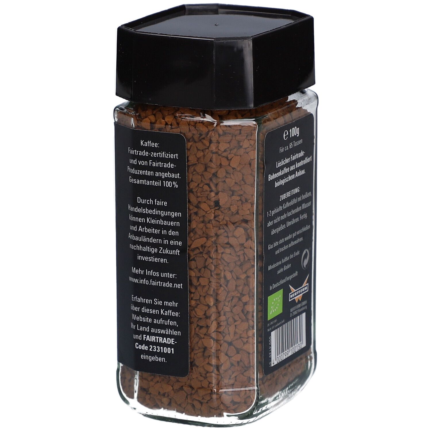 Glas mit Instant Kaffee. Aufschrift: 100g. Text über Kaffee. Fairtrade-Siegel und Naturland-Siegel.