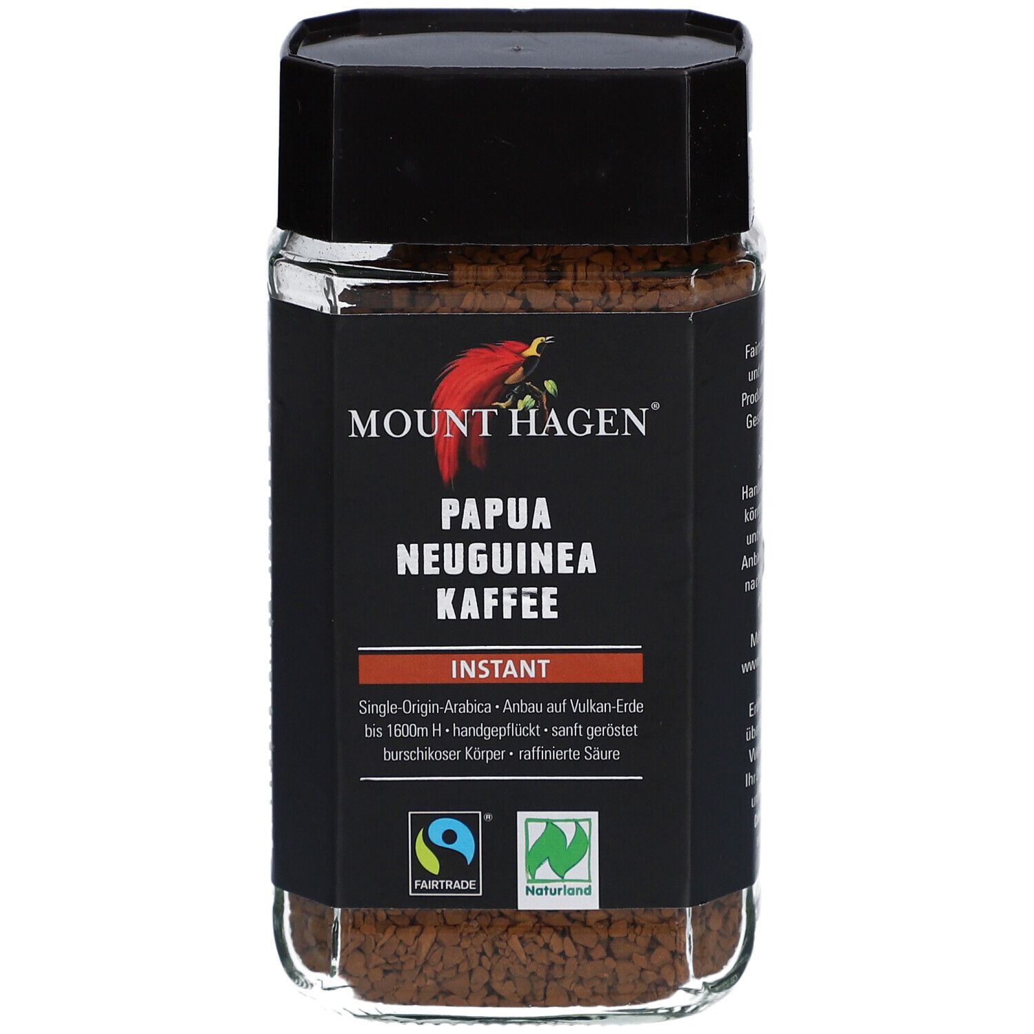 Glas mit Instant Kaffee. Aufschrift: Mount Hagen Papua Neuguinea Kaffee. Fairtrade-Siegel und Naturland-Siegel.