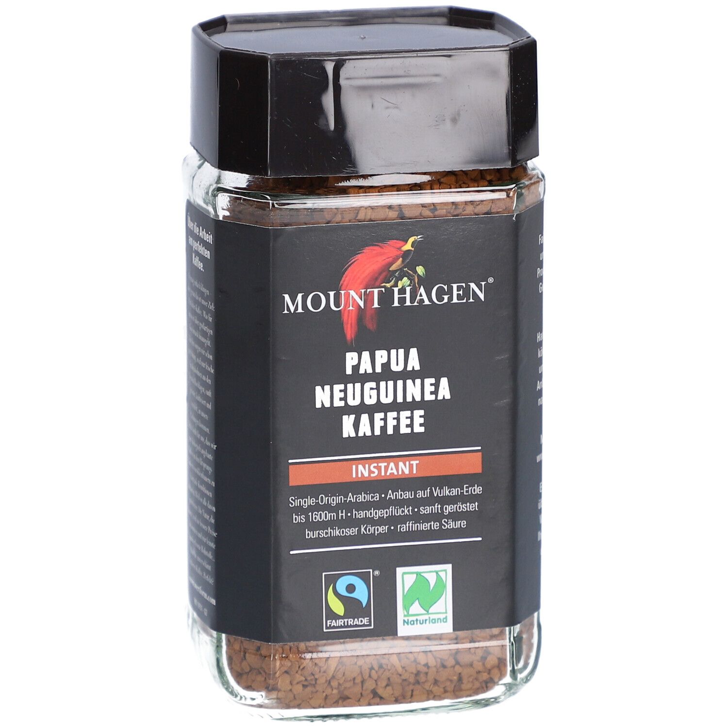 Glas mit Instant Kaffee. Aufschrift: Mount Hagen Papua Neuguinea Kaffee. Fairtrade-Siegel und Naturland-Siegel.