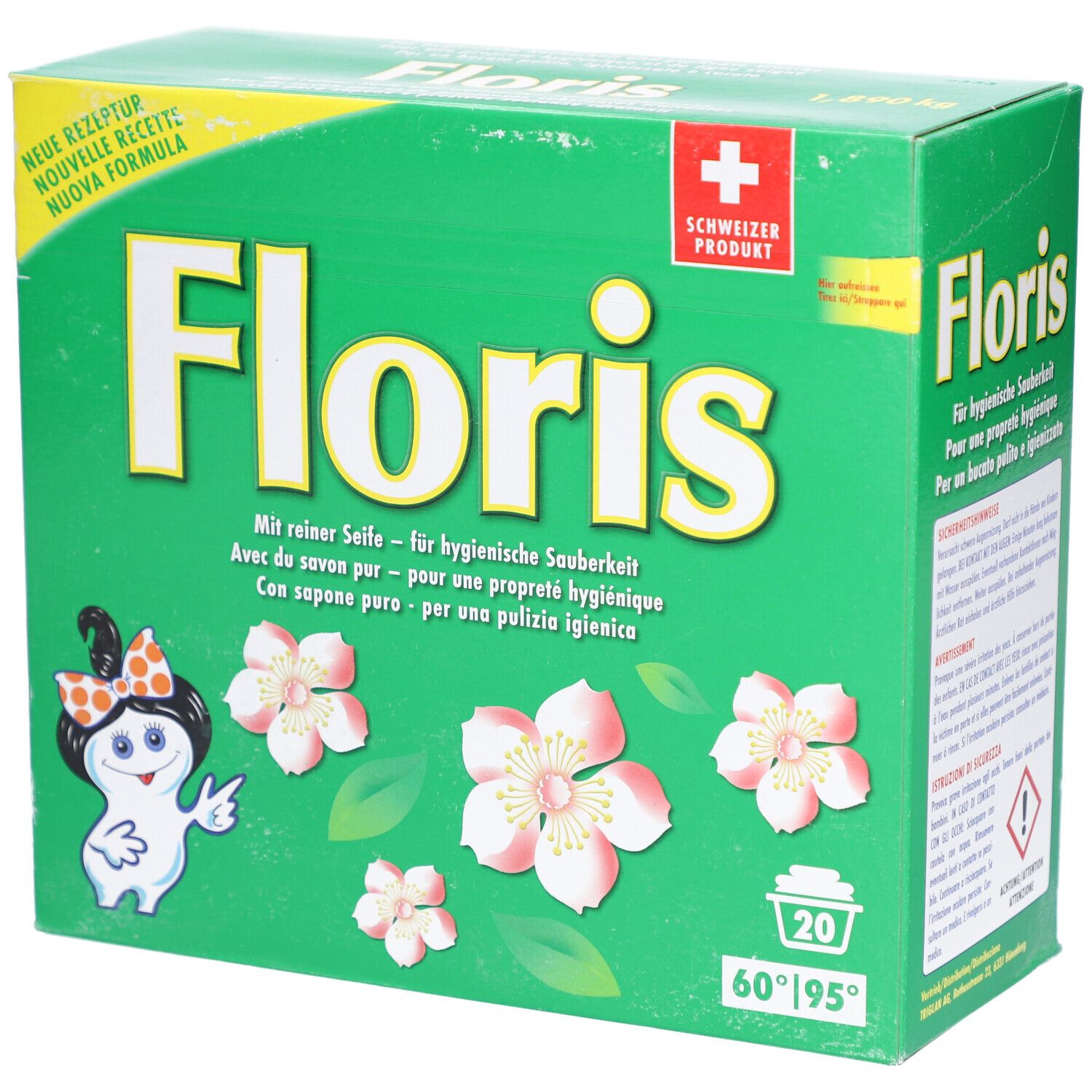 Grüne Schachtel mit "Floris"-Logo, Blumen und einem Cartoon-Charakter. Text in Deutsch, Französisch, Italienisch. Schweizer Produkt.