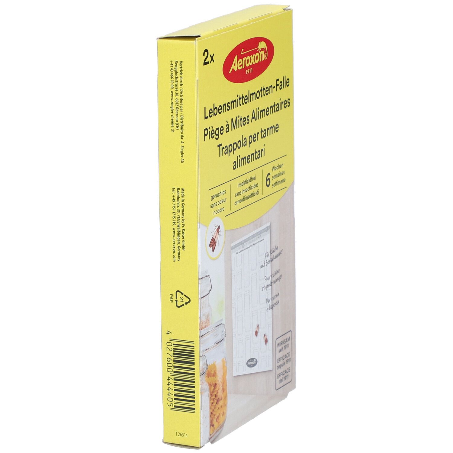 Zijaanzicht van gele verpakking. Productnaam en logo zichtbaar. Bevat twee vallen. Tekst in het Duits, Frans, Italiaans.