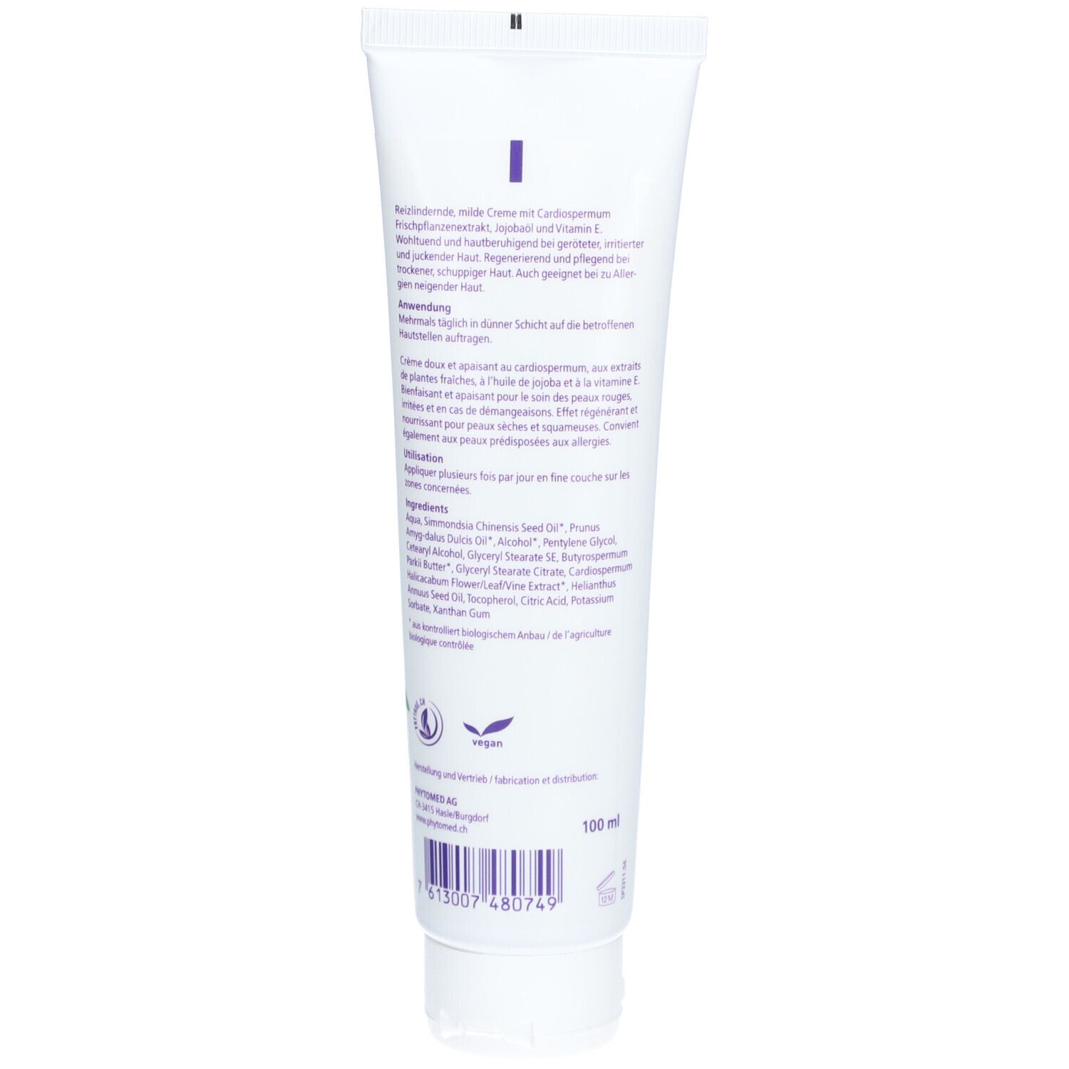 Rückseite der Creme-Tube. Text mit Inhaltsstoffen und Anweisungen. Vegan-Logo und Volumenangabe.