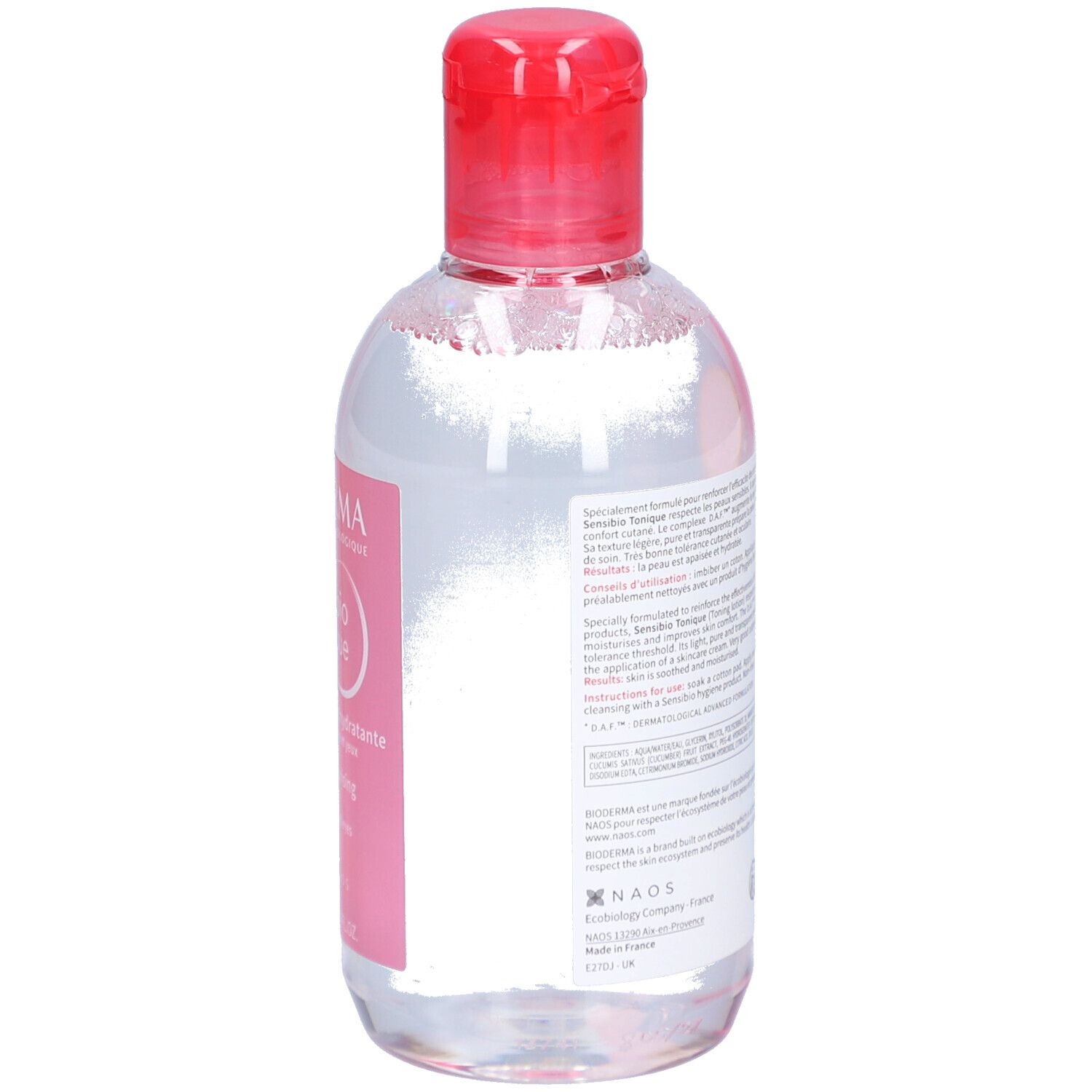 Rückseite der Flasche. Etikett mit Produktinformationen. BIODERMA Sensibio Tonique. Transparente Flüssigkeit.
