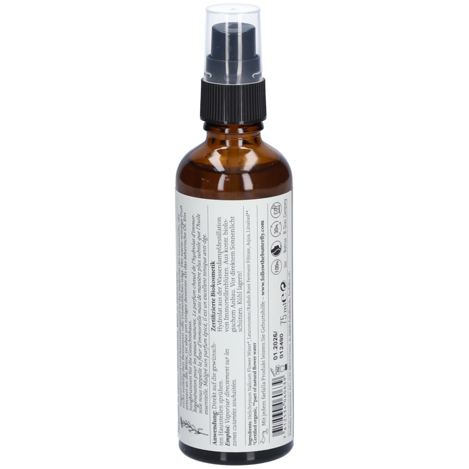 Braune Glasflasche mit Sprühkopf. Etikett mit Text. Produktinformationen, Inhaltsstoffe, Hersteller.