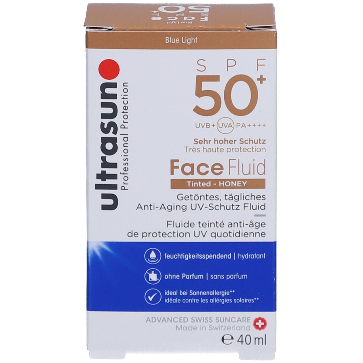 Braune Schachtel. Aufschrift: ultrasun, SPF 50+, Face Fluid, getönt, Honey. Schweizer Kreuz. Volumen: 40 ml.
