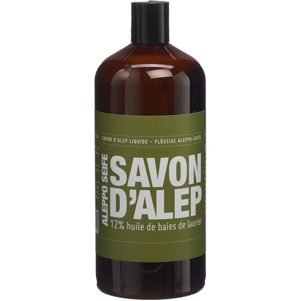 Braune Flasche mit schwarzem Deckel. Aufschrift: SAVON D'ALEP, 12% huile de baies de laurier. Aleppo Seife.