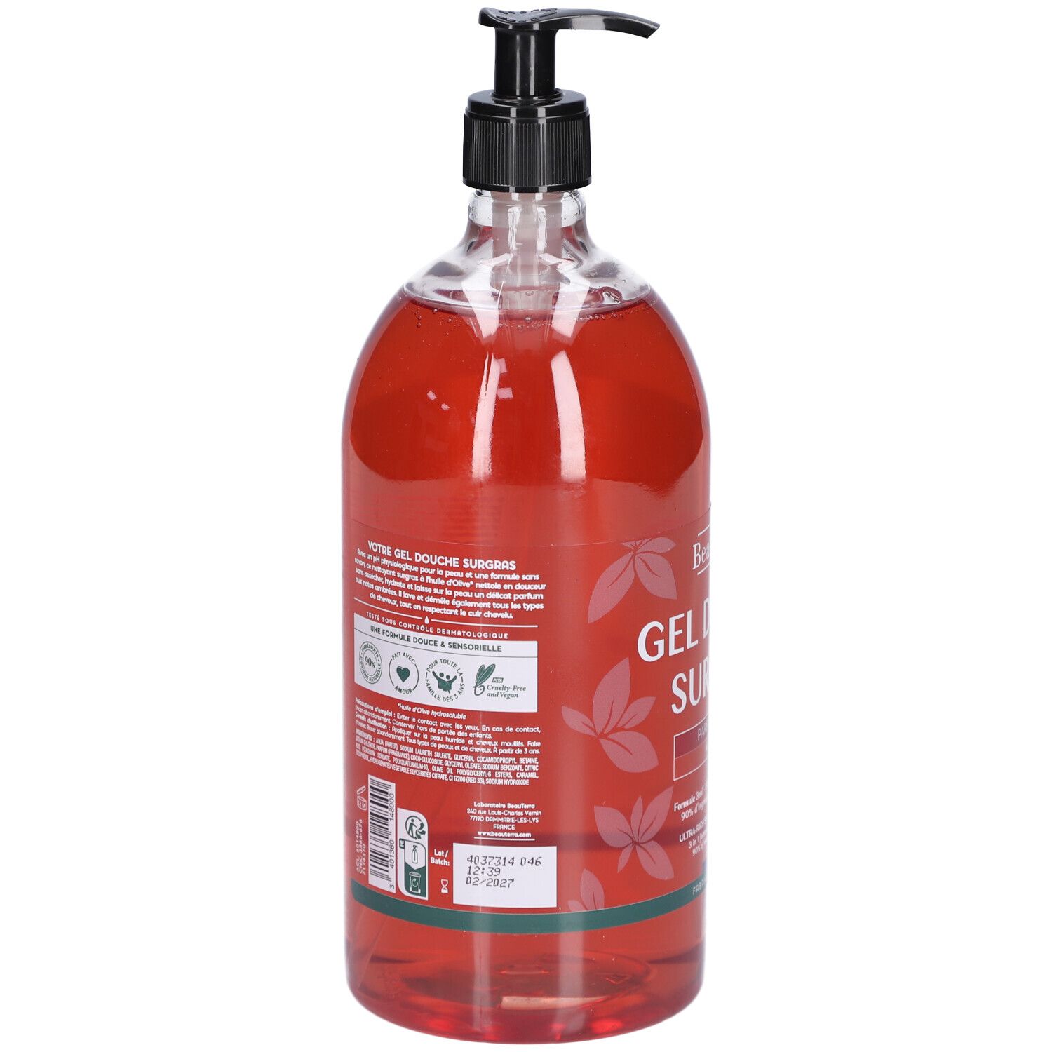 Rückseite der transparenten Flasche mit rotem Duschgel. Schwarzer Spender. Text und Logos. Etikett mit Informationen.