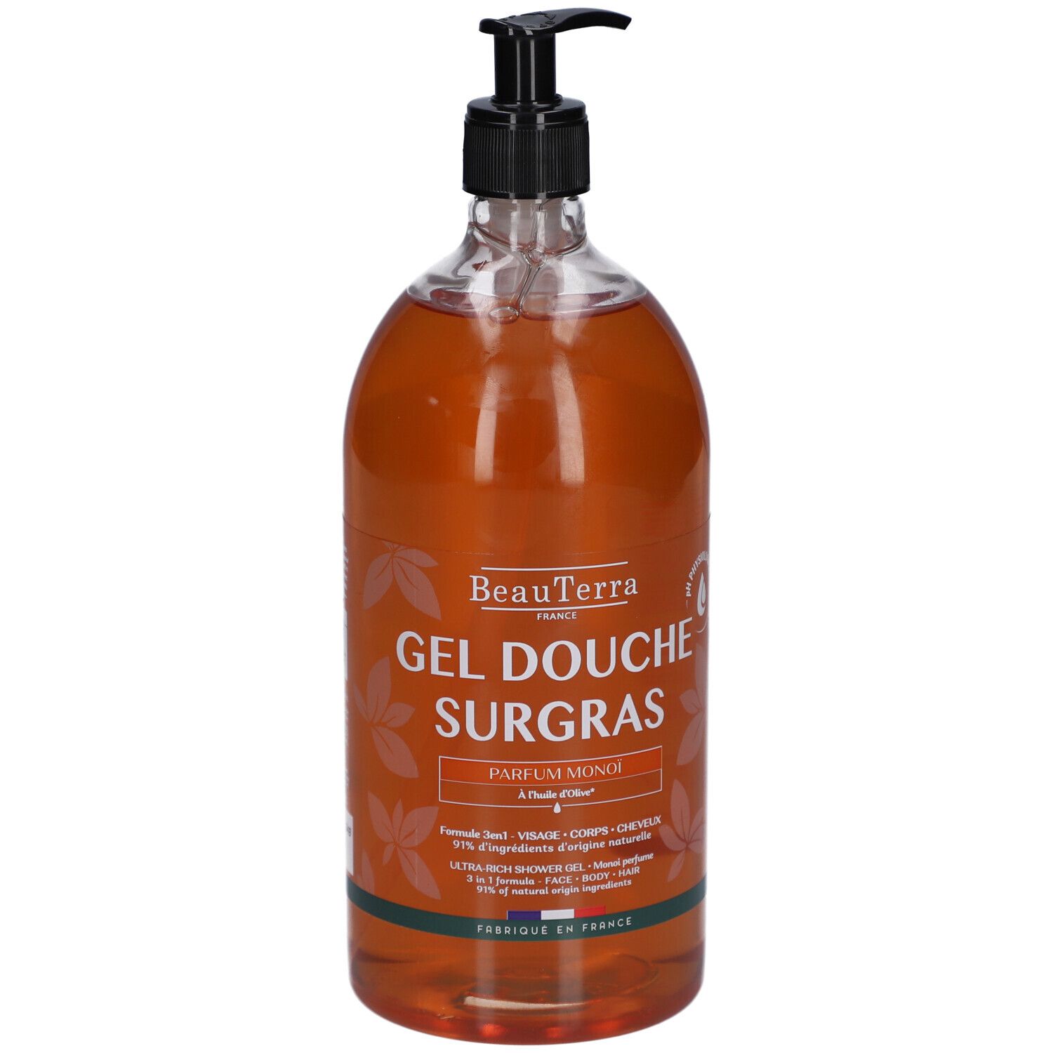 Transparente Flasche mit braunem Duschgel. Schwarzer Spender. Aufschrift: BeauTerra, Gel Douche Surgras, Parfum Monoï.