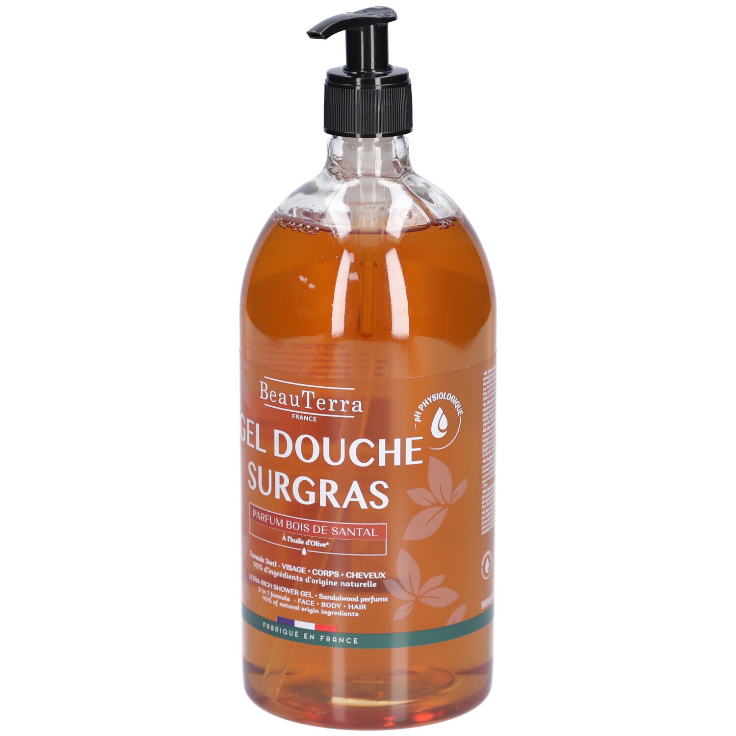Transparente Flasche mit braunem Duschgel. Schwarzer Spender. Aufschrift: Gel Douche Surgras, Parfum Bois de Santal.