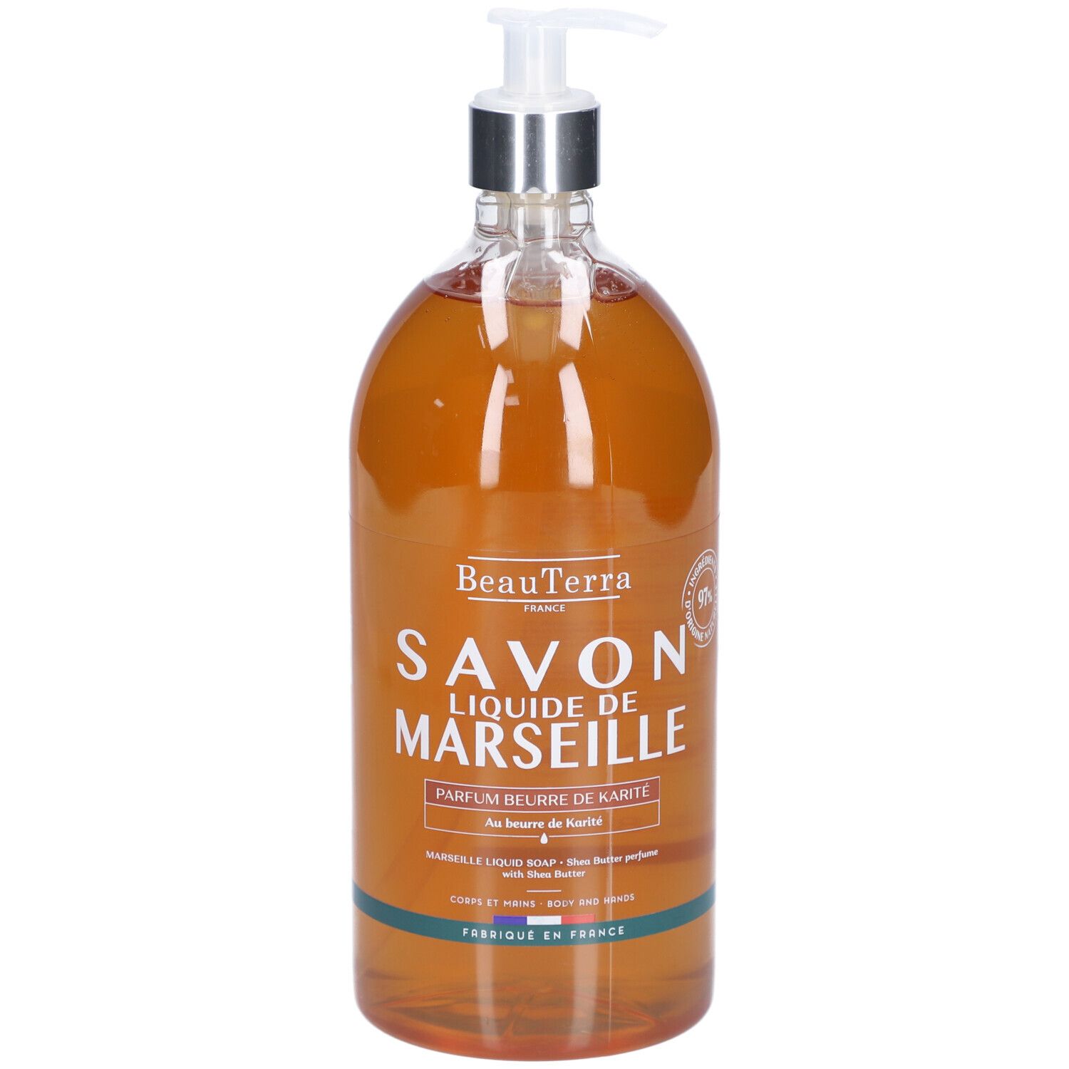 Savon liquide en flacon transparent avec pompe. Inscription: Savon Liquide de Marseille, Parfum beurre de Karité.
