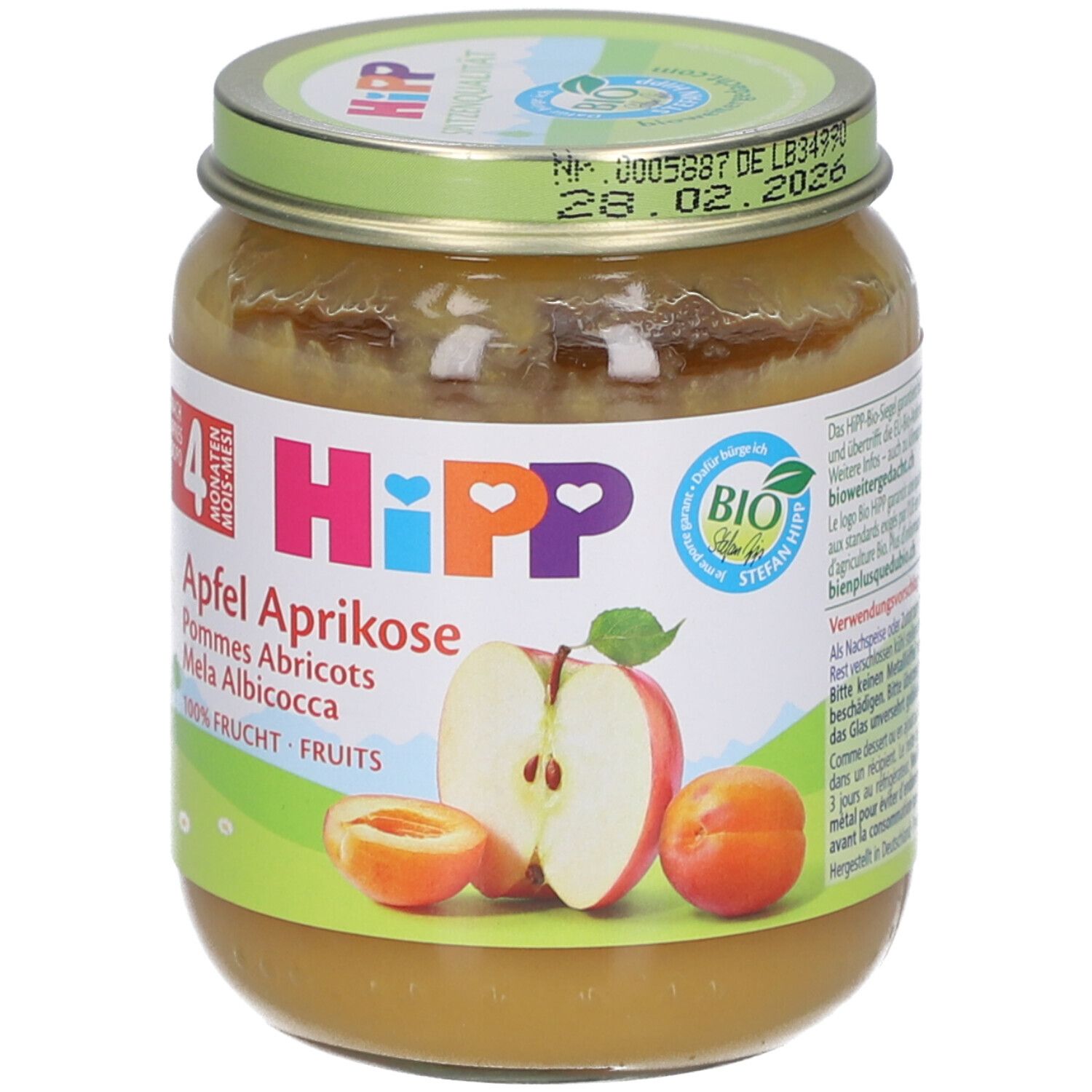 Pot de purée HiPP Bio-Pomme-Abricot. Étiquette avec nom du produit, illustrations de fruits et label bio. Couvercle avec date de péremption.