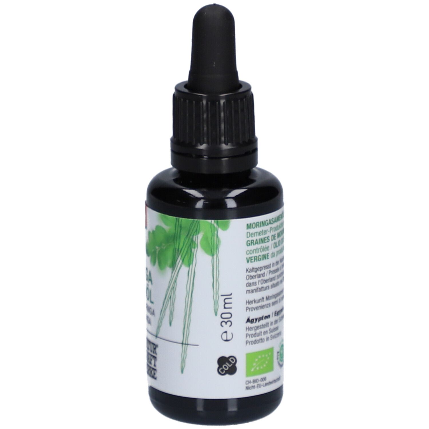Braune Glasflasche mit schwarzem Tropfer. Aufschrift: Moringa Samenöl, Demeter, Bio-Siegel, 30ml. Cold-Verfahren.