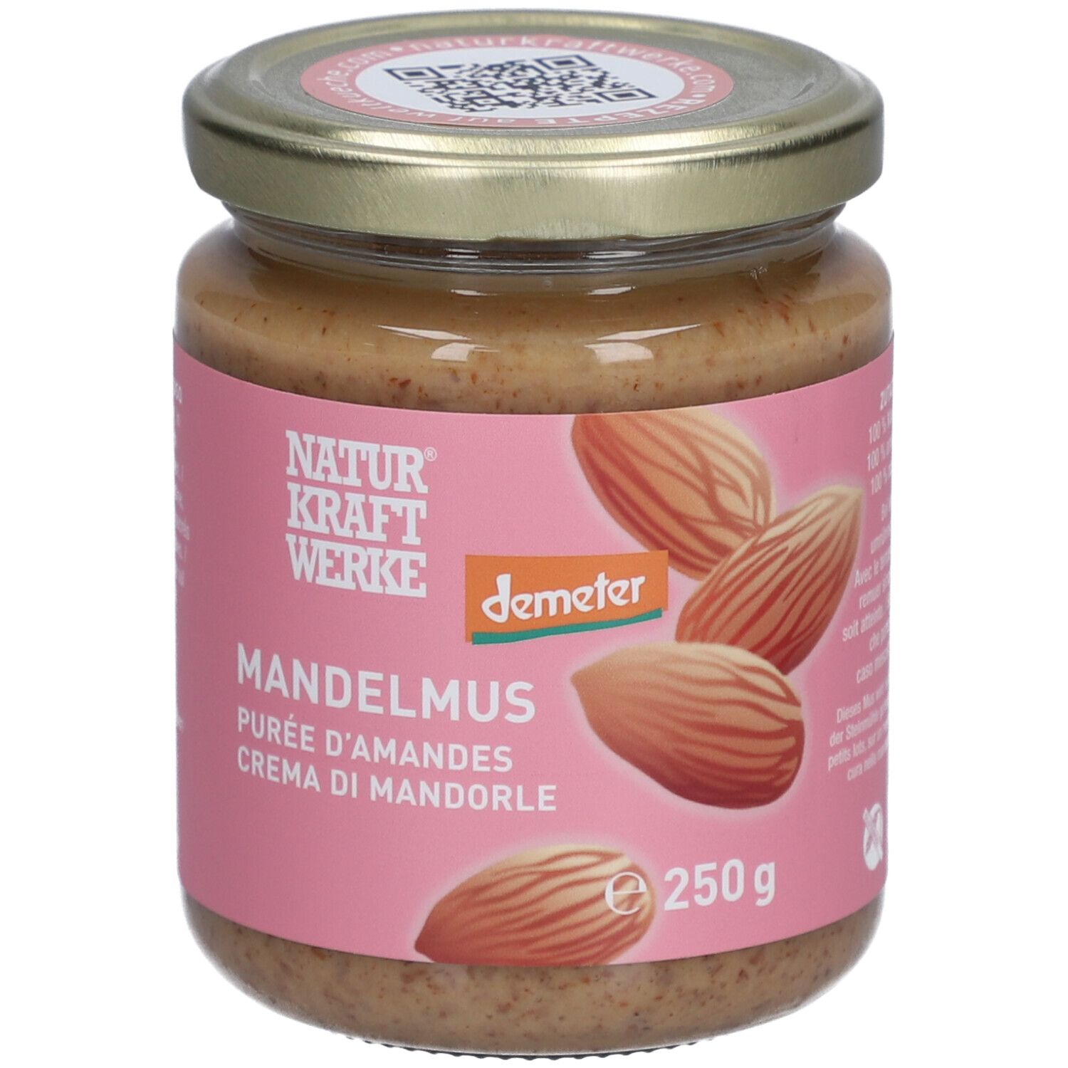 Glas mit Mandelmus. Rosa Etikett mit "NATURKRAFTWERKE", "MANDELMUS", "Demeter"-Logo und Mandeln. Deckel mit QR-Code.