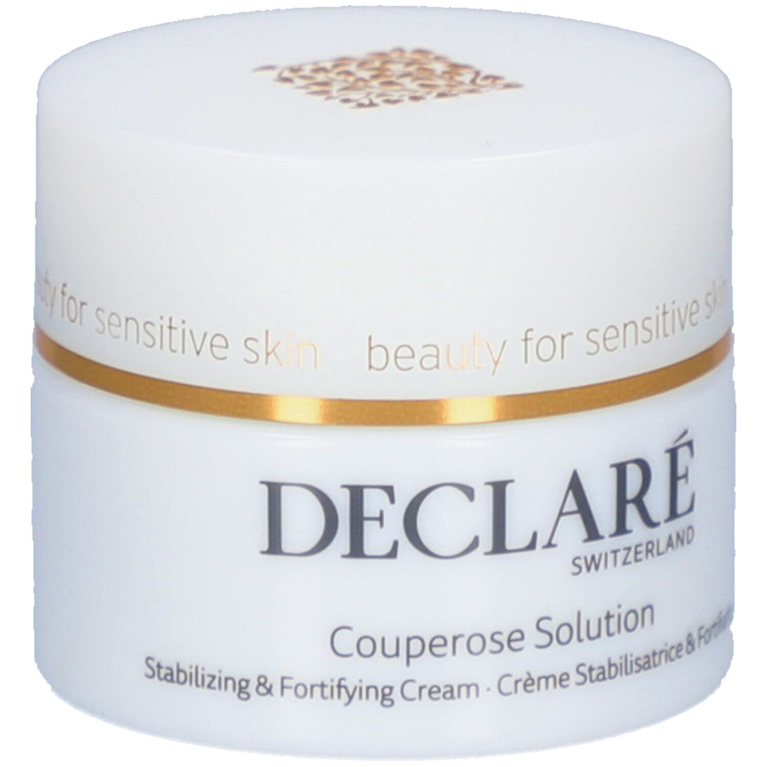Weißer Tiegel mit goldfarbenem Ring. Aufschrift: DECLARÉ SWITZERLAND Couperose Solution. Stabilisierende & stärkende Creme.