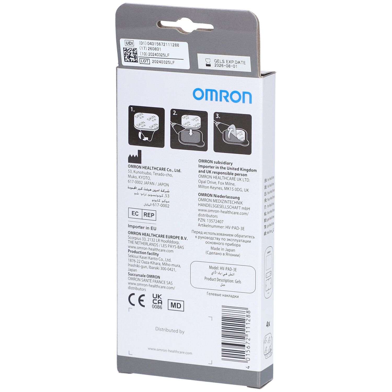Rückseite der Verpackung mit Informationen. OMRON-Logo, Produktinformationen, Herstelleradresse, Chargennummer und Haltbarkeitsdatum sind sichtbar.