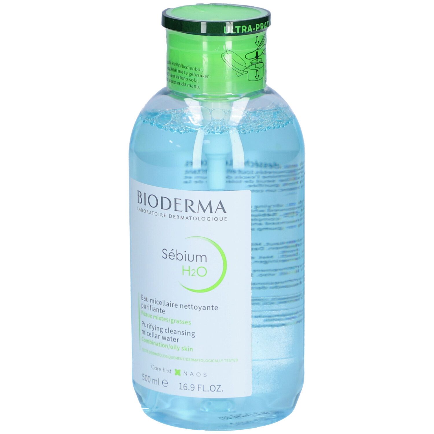 Flacon de liquide clair avec bouchon vert. Étiquette BIODERMA Sébium H2O. 500 ml.