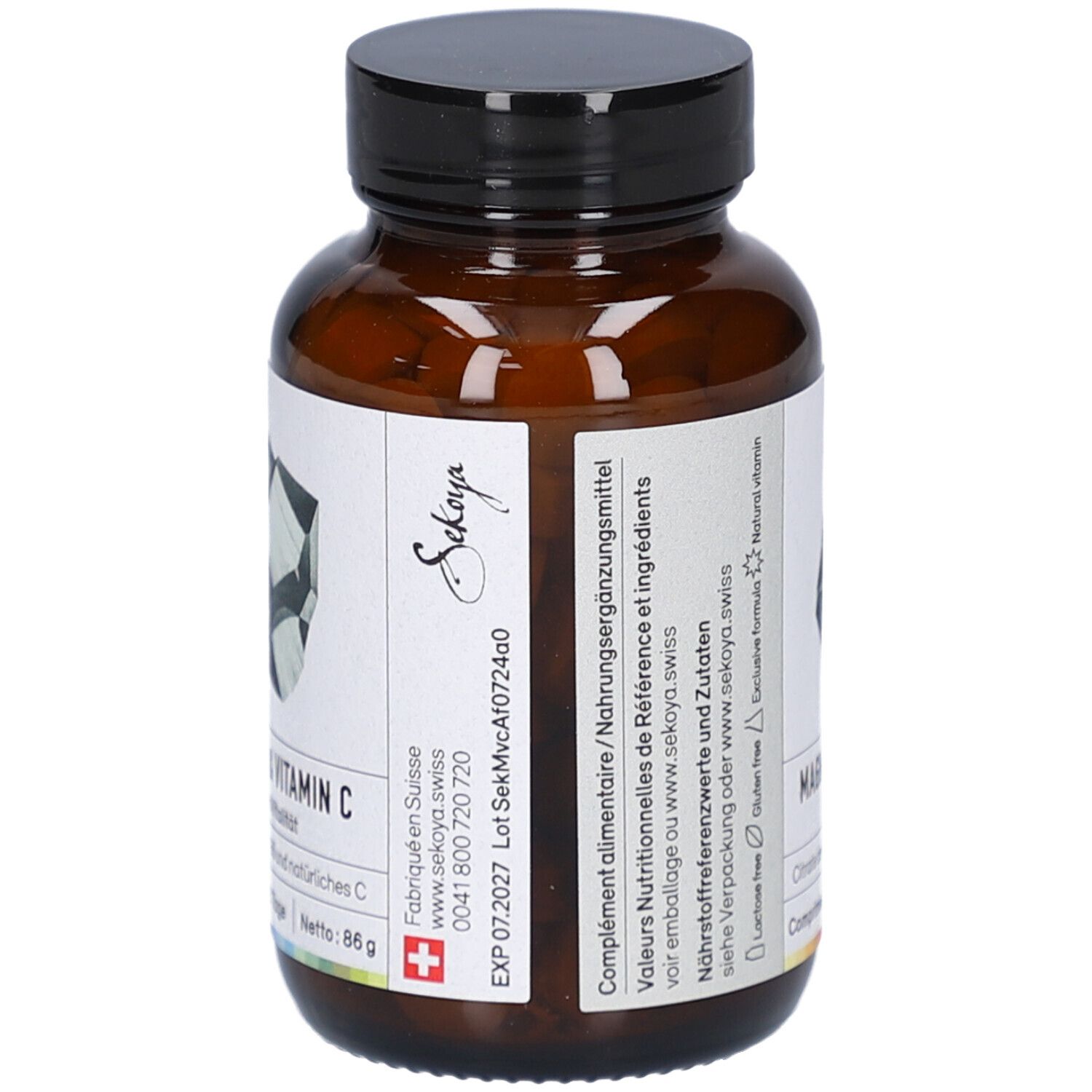 Braune Glasflasche mit schwarzem Deckel. Etikett mit Logo und Produktinformationen. Netto: 86 g. Hergestellt in der Schweiz.