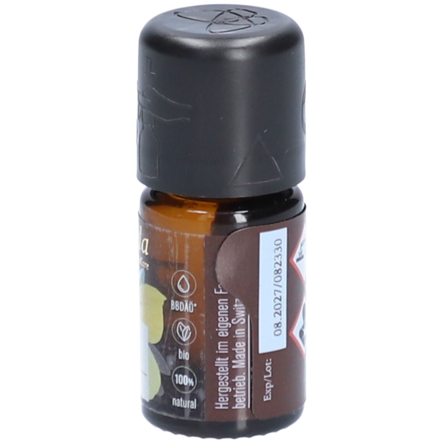 Flacon en verre brun avec bouchon noir. Inscription: farfalla. Étiquette avec label bio, 5 ml et date d'expiration. Fabriqué en Suisse.