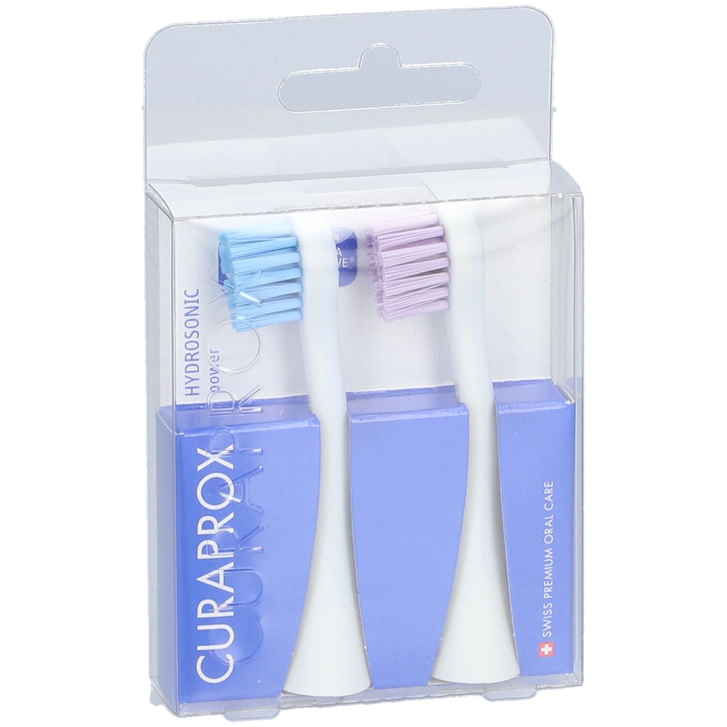Zwei Zahnbürstenköpfe in Verpackung. Blaue und lila Borsten, blaue Halterung, CURAPROX-Logo, Swiss Premium Oral Care.