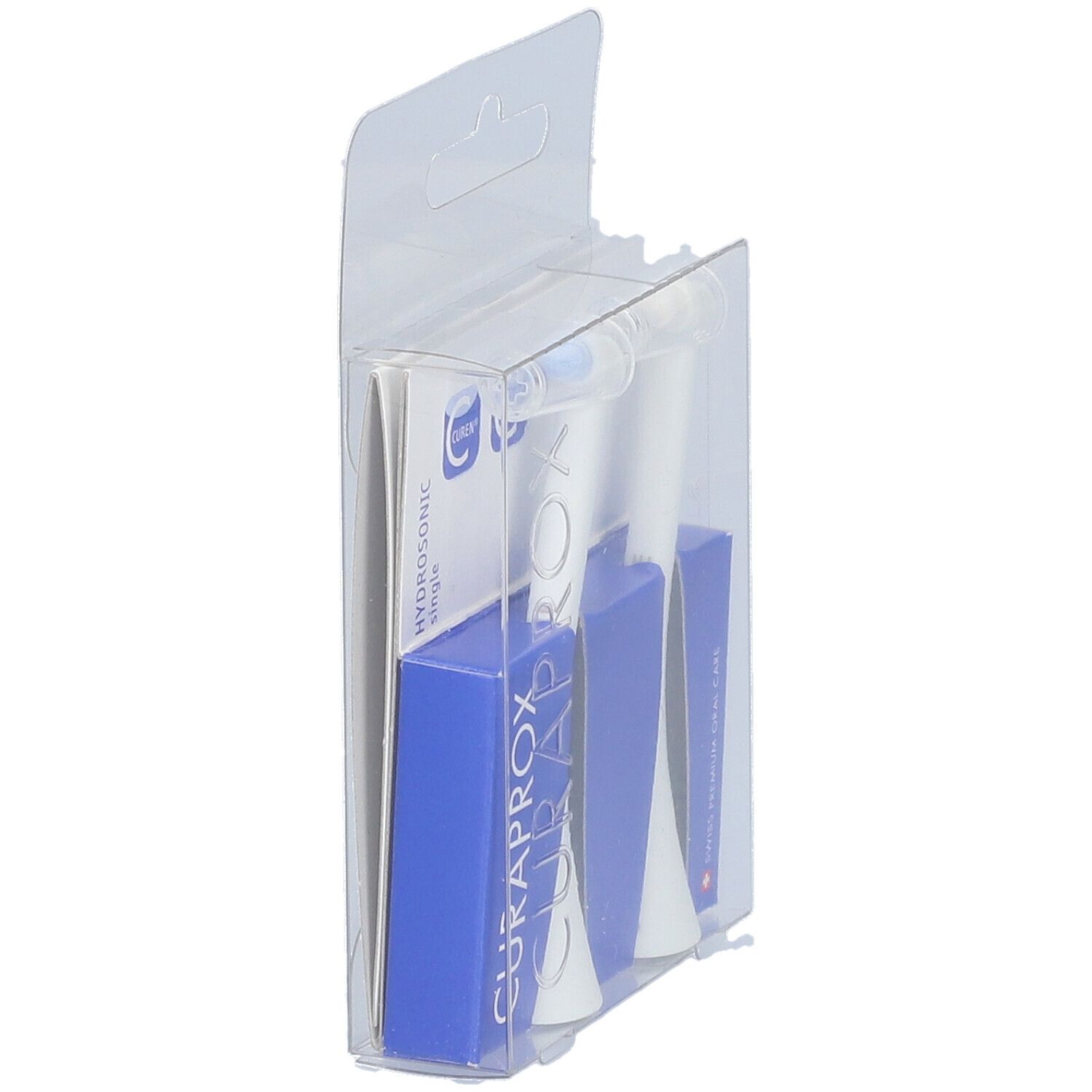 Verpackung mit zwei weißen Bürstenköpfen. Blaue Kartons mit CURAPROX-Logo, in transparenter Hülle.