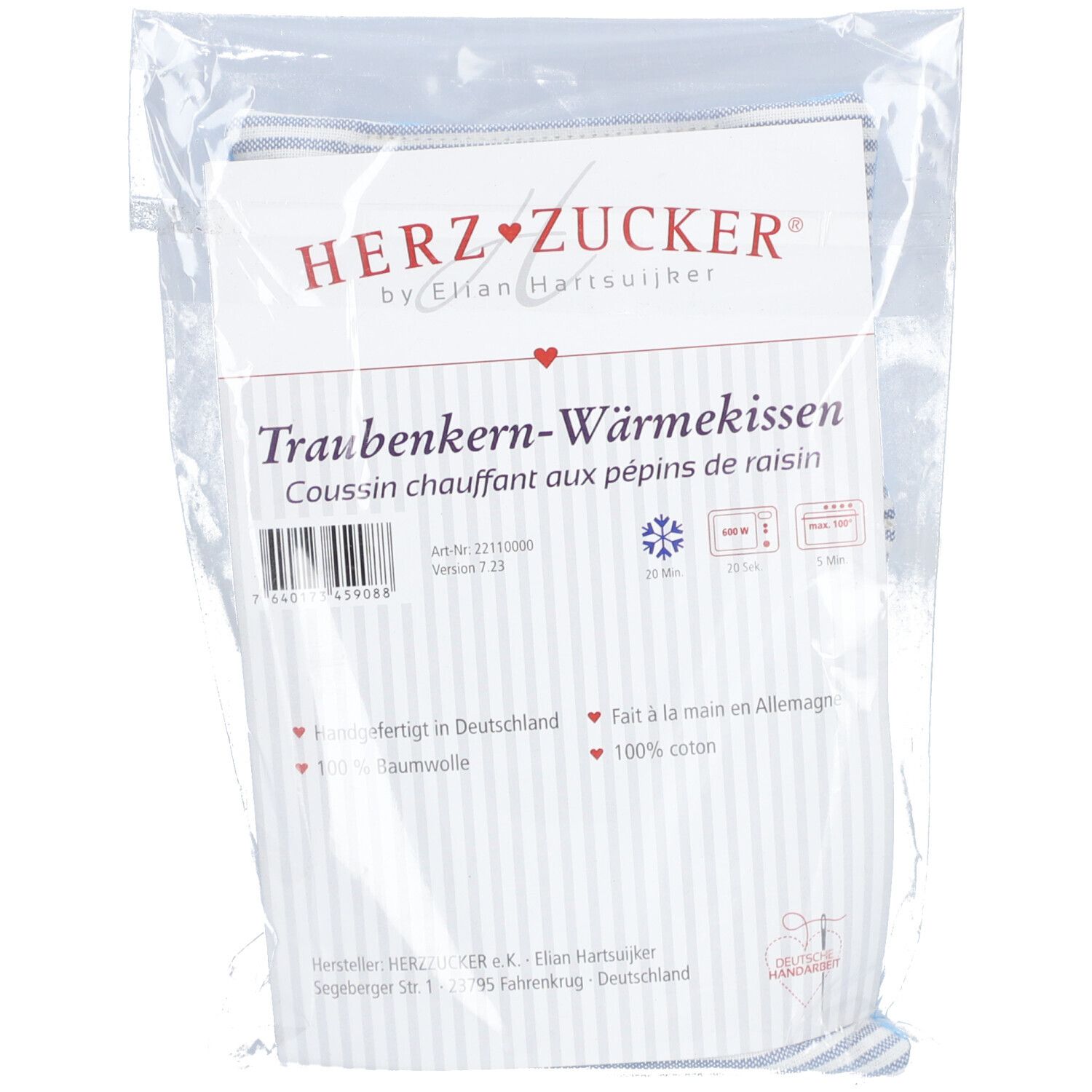 Verpackung mit HERZ ZUCKER Wärmekissen. Text: Traubenkern-Wärmekissen, 100% Baumwolle.