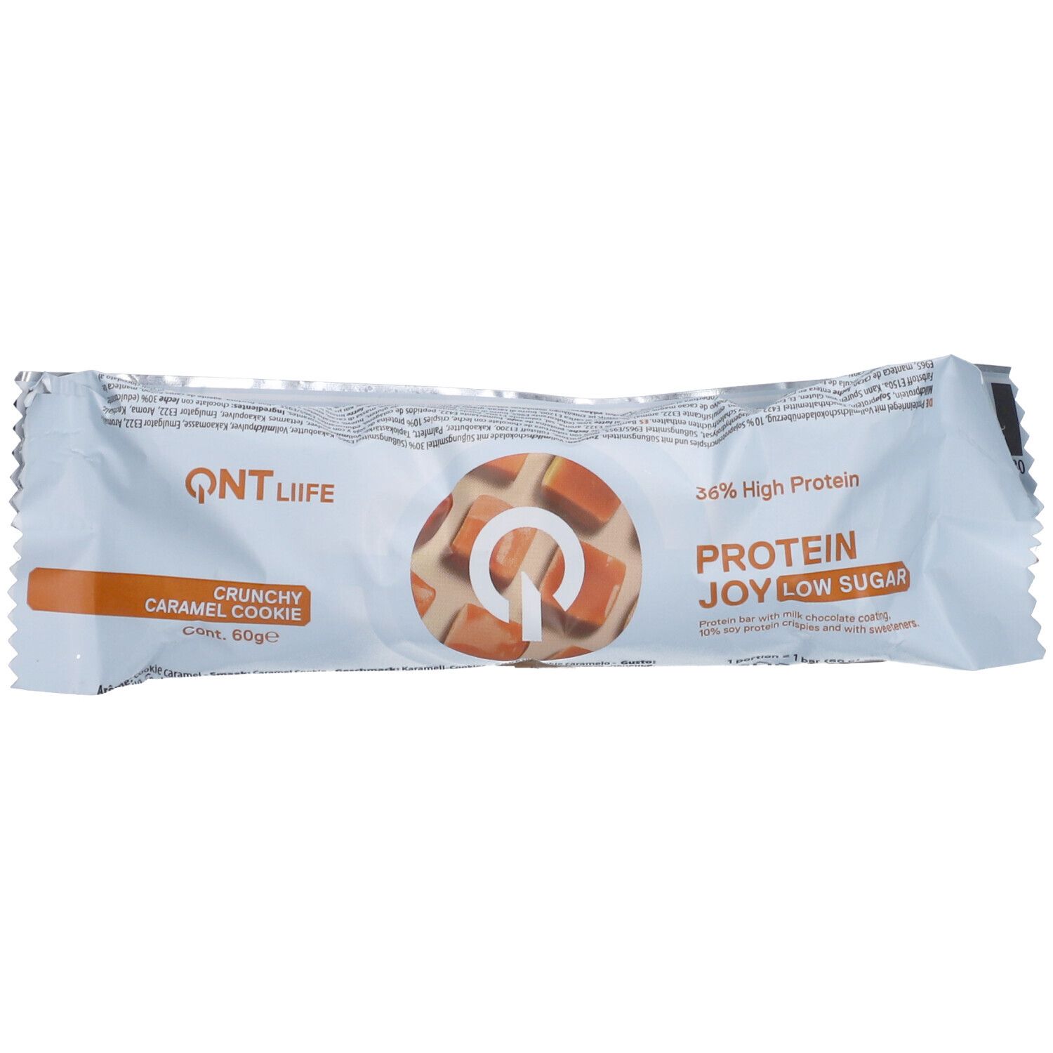 Verpackung eines Proteinriegels. Aufschrift: QNT Life, 36% High Protein, Protein Joy Low Sugar. Abbildung von Karamellstückchen.