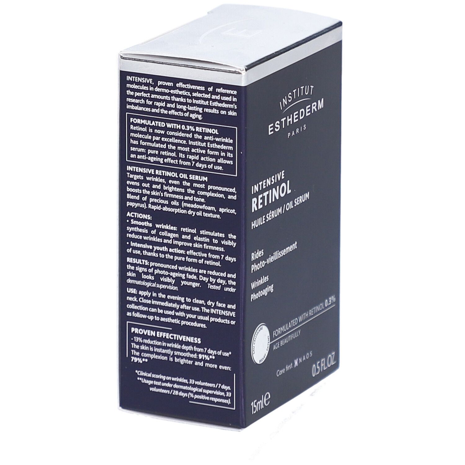 Dunkelblaue Schachtel mit Text. INSTITUT ESTHEDERM, Intensive Retinol Öl Serum. Text: RIDES, Photo-vieillissement, Wrinkles, Photoaging. 15ml, 0.5 FL.OZ.