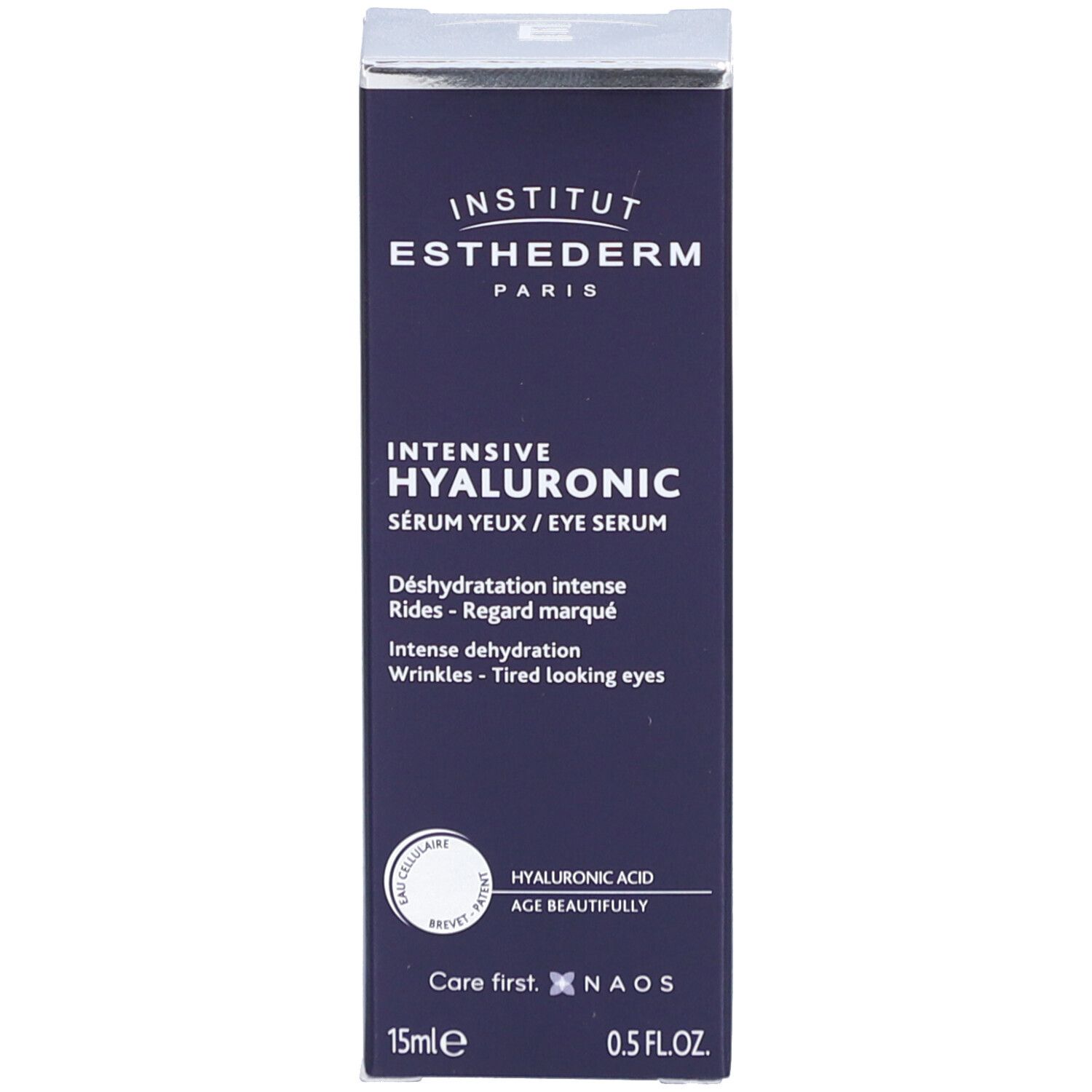 Boîte bleu foncé avec texte blanc. Nom du produit et logo. Inscription: Intensive Hyaluronic Sérum yeux.