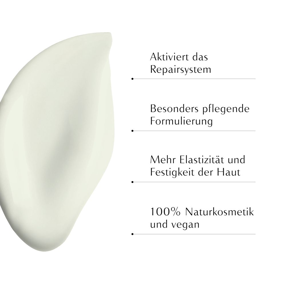Creme-Textur mit Text: Aktiviert das Reparatursystem, pflegende Formel, mehr Elastizität, 100% Naturkosmetik.