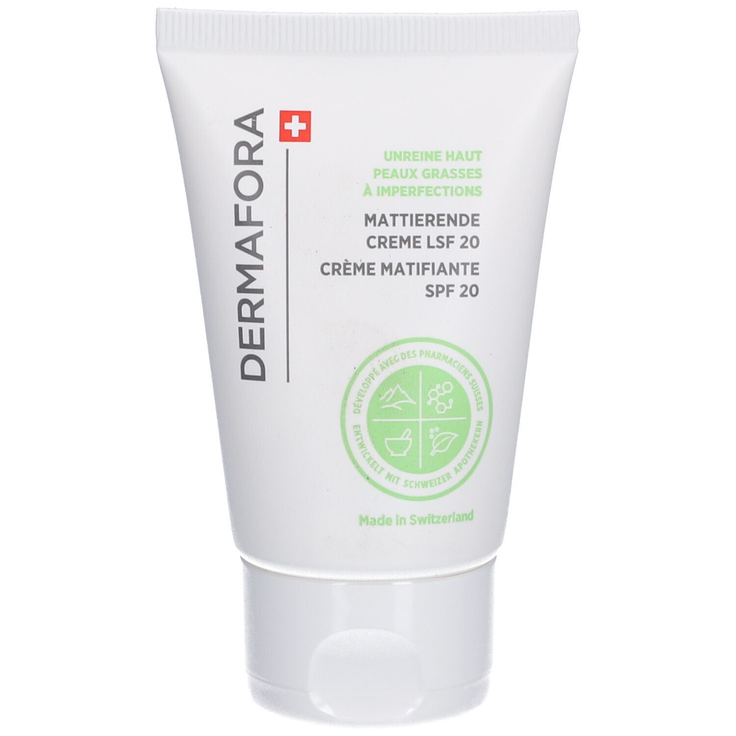 Weiße Tube mit grünem Logo und Text. Enthält DERMAFORA Mattierende Creme LSF 20. Schweizer Kreuz.