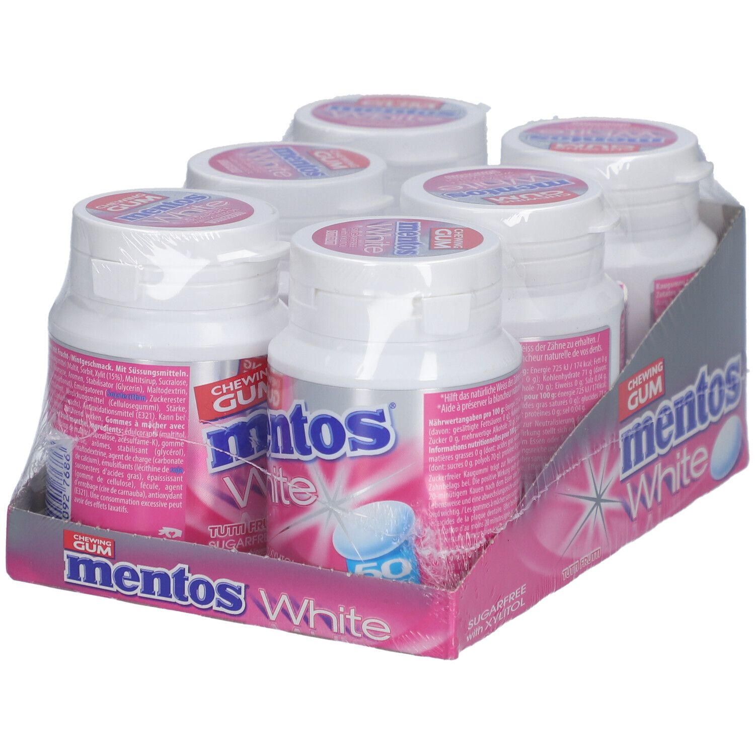 Sechs Flaschen Mentos White Kaugummi in einer Verpackung. Weiße Flaschen mit rosa Etiketten und Deckeln. Verpackung mit Mentos-Logo.