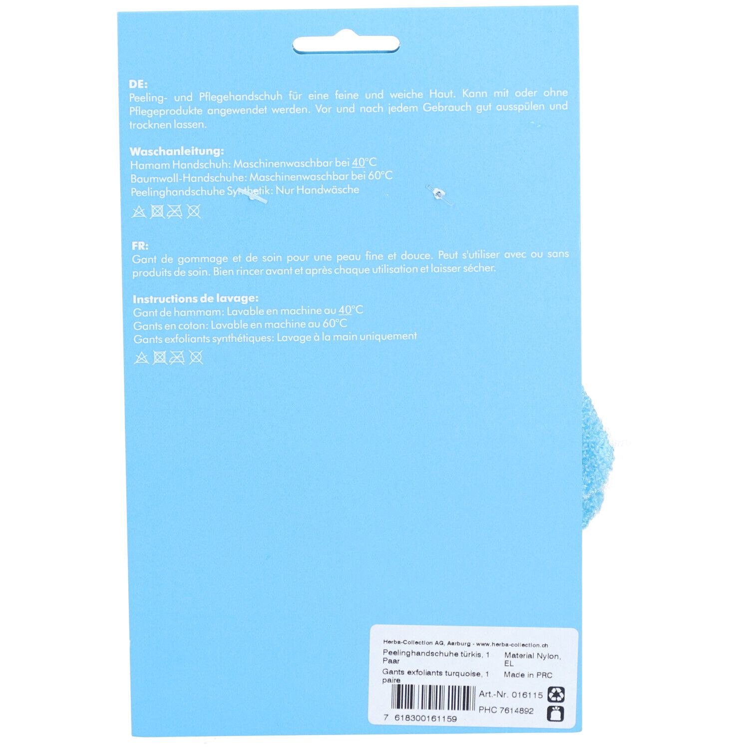 Türkisfarbener Peeling-Handschuh auf hellblauem Karton. Waschhinweise und Produktinformationen sind aufgedruckt.