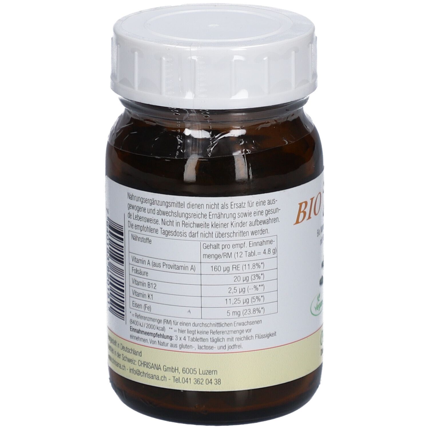 Rückseite der braunen Glasflasche. Etikett mit Nährwertangaben. Enthält Vitamin A, B12 und Eisen. Weißer Deckel.